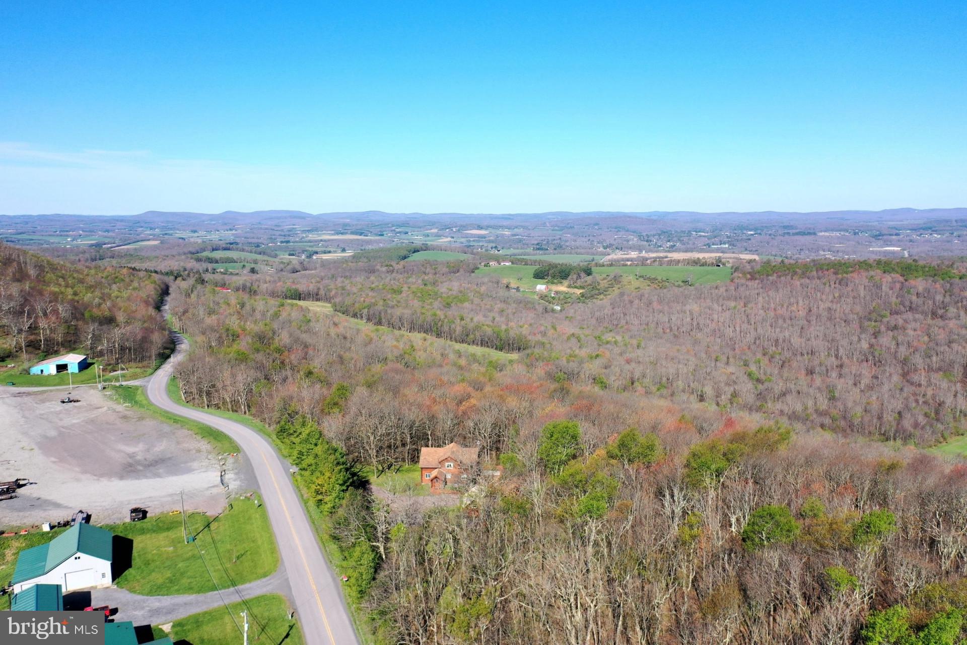 50 Acres. Two Parcels. Zero Restrictions. Located along Bethlehem Road in Oakland, Garrett County, Maryland, this extraordinary 50-acre opportunity — comprised of two adjacent 25-acre parcels — is one of the rarest and most breathtaking pieces of unrestricted land available anywhere in western Maryland today. No zoning, no HOA, no flood zone, and no wetlands — every acre entirely and permanently yours to use however you envision. Every structure type is fully welcomed — site-built homes, barndominiums, modular homes, manufactured and mobile homes, and RVs — while hunting, camping, and livestock rights make this a perfect fit for every lifestyle and every dream. Road access via easement off Ferguson Road. Just 1 hour from Cumberland and 2 hours and 23 minutes from Pittsburgh, sitting at the heart of Garrett County's world-renowned outdoor recreation paradise — home to Deep Creek Lake, Wisp Resort skiing, championship fishing, and some of the most breathtaking scenery the entire Mid-Atlantic has ever produced. Whether you are building your forever home, launching a homestead, creating a private recreational retreat, or securing a rare and appreciating piece of western Maryland land — this property rises to meet every vision with freedom, beauty, and lasting worth. Fifty unrestricted acres this magnificent do not wait — your legacy starts right here.