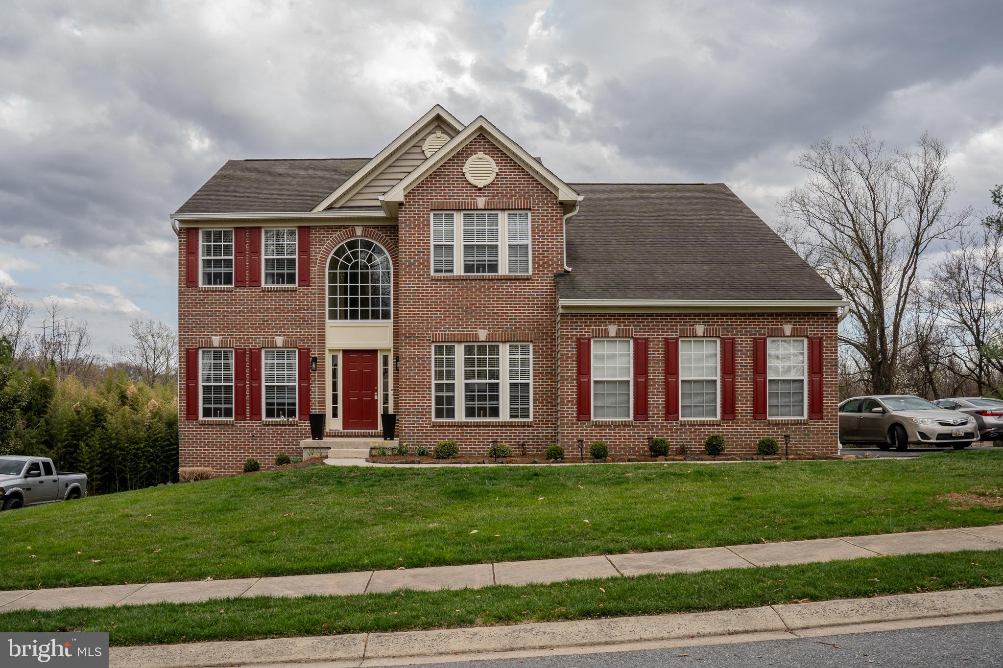 Welcome to this stunning and beautiful Brick Front Colonial single-family home in Perry Hall.  This home boasts 5 bedrooms with 3 full bathrooms and a half bath.  There are many windows throughout the main level to bring in fresh, natural light to illuminate all the house. This home features the 2 stories foyer with curved staircase and with gleaming hardwood floors.  There are a large formal living room and dining room combination to the left and an office to right with a half bathroom.  The large eat-in kitchen has been renovated with granite counter top and stainless-steel appliances. There is plenty of space and counter top for cooking and gathering in this large eat-in kitchen.  This kitchen also offers a breakfast area that comes with a morning room.  You can walk out to the large deck from the morning room.  The very large family room offers a gas fireplace and lots of windows.  The spacious master bedroom offers a large private bathroom and there are plenty of closet spaces.  There are 3 additional large bedrooms and full hall bath.  The lower level offers a massive recreation room, with and exercise space and the 5th bedroom with a full bath.  The basement also walks out to a large backyard.  There are 2 car side entrance garage and long driveway for plenty of parking.  This house is immaculate through-out and it is minutes away from all the great amenities.  The house was renovated with Hardwood floor in the den/office, family room, steps and 2nd floor landing and hallway.  The Kitchen was renovated with all stainless-steel appliances, granite countertop and backsplash.  The patio with walkout walkway and the deck were renovated also.  The washer was replaced in 2020.  The HVAC system is about 2 years old and the basement flooring is brand new.  The homesite & cleared portion of the lot is approximately .5 acres and the remainder of 4.87 acres is designated for Forest Conservation area.  Welcome home!