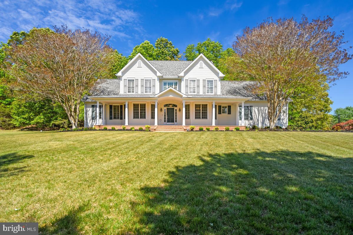 Welcome to your new home in Lake Jameson — where space, comfort, and timeless design come together on a beautiful 3-acre flat corner, prime lot. This stunning 4-bedroom, 3.5-bath home offers everything you're searching for, including a sought-after main-level primary suite with a beautifully renovated en-suite bathroom featuring a classic clawfoot tub and a luxurious doorless walk-in tiled shower. From the moment you enter, you’ll be impressed by the dramatic two-story great room highlighted by a floor-to-ceiling stone fireplace that creates the perfect centerpiece for relaxing or entertaining. Throughout the home, you’ll find rich wood and ceramic tile flooring, elegant trim work, custom built-ins, and dual staircases that add both character and functionality. The spacious kitchen is designed for both everyday living and entertaining, complete with granite countertops, stainless steel appliances, 42” cabinetry, a large peninsula, and even a premium Miele steamer oven. Additional features include a huge bonus room, unfinished basement with endless potential, and a side-load 2-car garage. Major updates have already been taken care of, including a recently replaced roof and propane furnace, giving peace of mind for years to come. Outside, the premium flat lot is enhanced with a full irrigation system covering both front and rear beds as well as yard zones — ideal for maintaining the beautifully landscaped property. Homes like this rarely become available in highly desirable Lake Jameson. Schedule your private showing today before this exceptional property is gone!