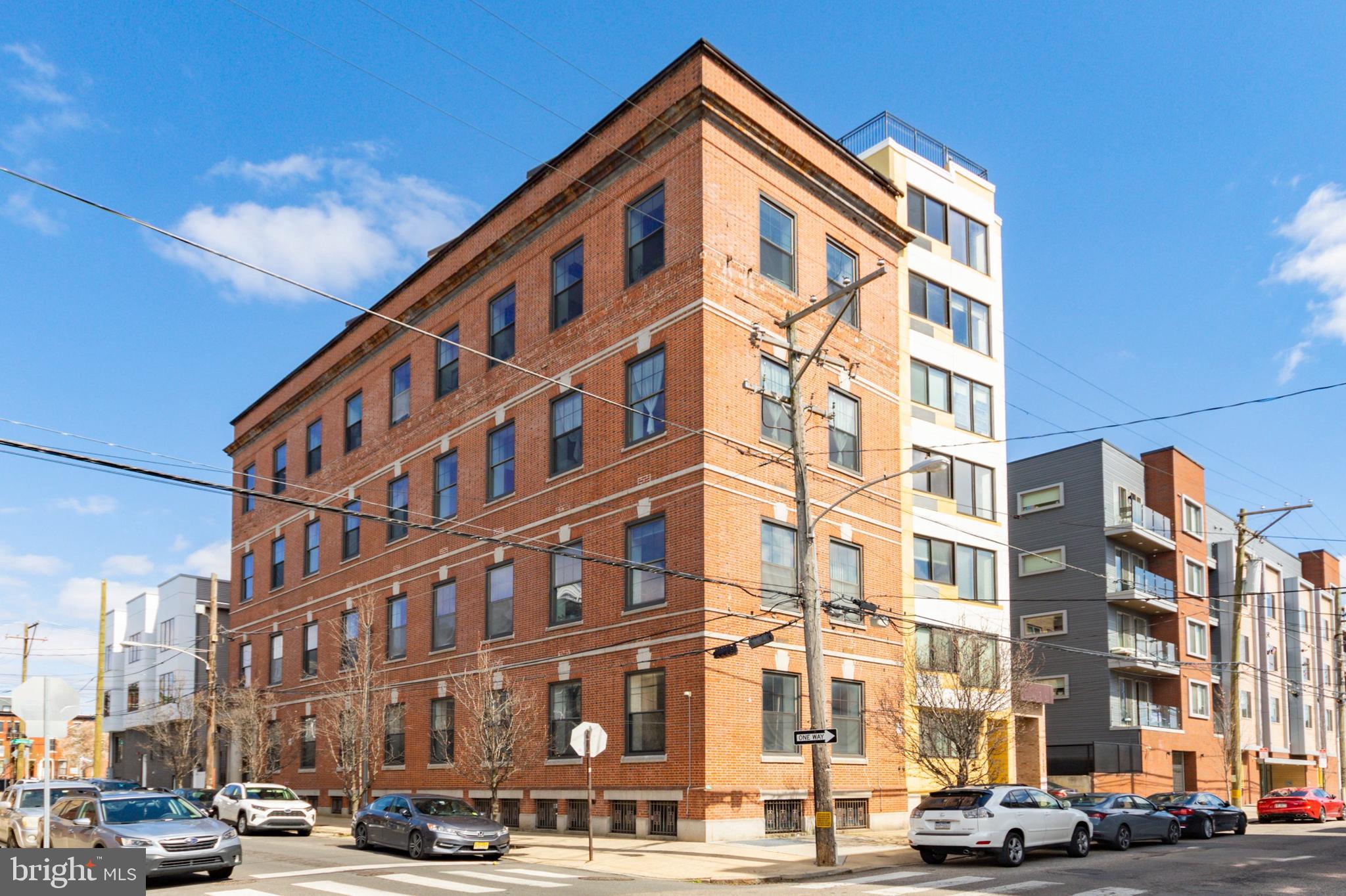 Available for June move in: History meets impeccable new construction in this beautifully designed building. Enter through the former Bell Telephone Exchange building, now with a fantastic new addition of new construction condominiums and known as The Exchange. The building combines industrial details with well thought out living spaces. This condominium is a spacious one bedroom, one bath, with its own in unit washer & dryer in HUGE walk in master closet. Modern kitchen with all stainless steel appliances including dishwasher, granite countertops. Light bamboo flooring throughout entire space, including the bedroom. AMAZING closet space. Great natural light from both northern and southern exposures. Common roof deck with outdoor furniture offers incredible skyline views! Great Francisville location offers walking distance access to public transit, with the Girard Broad Street line stop just a short 2 blocks away. Walk to all that the Fairmount and Art Museum Areas have to offer - wonderful shops and cafes, museums, and more.  Pet friendly with deposit or fee based on type/weight, no breed or weight restrictions. Photos are of nearly identical unit in the building. Unit located on the 1st floor.
