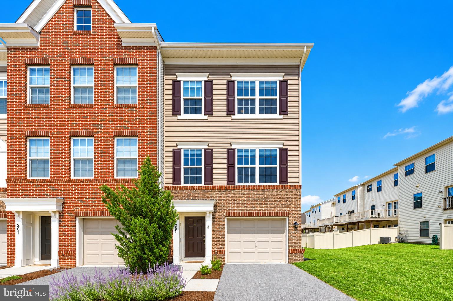 Welcome to this beautifully maintained end-unit townhome built by CalAtlantic Homes (formerly Ryland Homes), located in the highly desirable Jefferson Place community. Offering three finished levels, an attached garage, and an open, light-filled floor plan, this home is designed for today's lifestyle. The gourmet kitchen features a stunning 13-foot granite center island, gas cooking, stainless steel appliances, a double-wide refrigerator, and abundant cabinet space, making it perfect for entertaining family and friends. Step outside to the freshly stained deck overlooking the rear yard. The sun-filled lower level offers a full walkout leading to the new concrete patio, creating the perfect space to relax or entertain outdoors while providing flexible living space ideal for a recreation room, home office, or guest area. Upstairs, you'll find the convenience of a full-size washer and dryer on the bedroom level, along with two spacious primary suites, each with its own private bathroom. Freshly painted throughout, this move-in-ready home is just minutes from Historic Downtown Frederick, shopping, dining, and major commuter routes. Residents of Jefferson Place enjoy resort-style amenities including a community pool, clubhouse, tennis and basketball courts, playgrounds, and scenic mountain views. Don't miss this exceptional opportunity to own a stylish, low-maintenance home in one of Frederick's most sought-after communities.