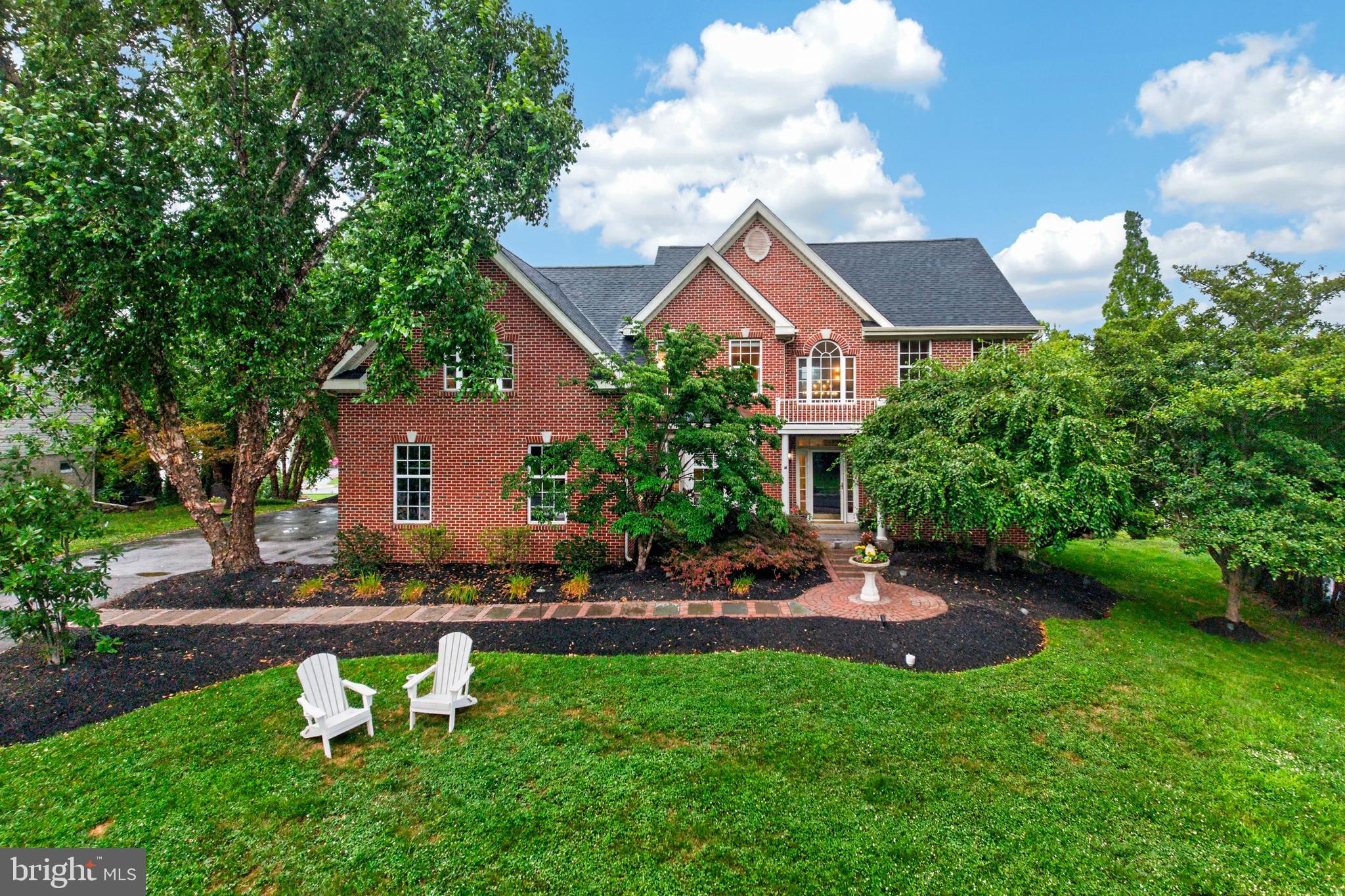 Welcome to this exceptional custom home in the highly sought-after Meadows at Valley Forge in Schuylkill Township. Perfectly positioned in one of the community's most desirable locations, this residence enjoys front views of the original estate barn, a beautiful reminder of the property's rich history, and breathtaking rear views overlooking Valley Forge Park from the huge rear deck. Featuring countless custom details, a brand-new roof (July 2026), and custom updates throughout, this home offers a rare combination of character and privacy.
The heart of the home is the spectacular gourmet kitchen, thoughtfully designed with custom details, beautiful finishes, and everything needed for both everyday living and entertaining. This chef’s dream kitchen features exquisite custom cabinetry, extensive storage, granite countertops, large island, under counter lighting, Bosch dishwasher, GE Monogram appliances, built-in refrigerator and freezer, appliance garage, custom range hood, and a six-burner gas cooktop with pot filler. Brazilian cherry hardwood flooring extends throughout the kitchen and most of the main level, adding warmth and elegance, while the tongue-and-groove wood ceiling and custom finishes create a truly one-of-a-kind kitchen.
A beverage station with refrigerator provides the perfect spot to gather before stepping through the sliding glass doors to the expansive vinyl deck overlooking Valley Forge Park. Outdoor living is exceptional with beautiful hardscaping, mature landscaping, exterior landscape lighting, and a private, peaceful setting. Additional exterior features include a hardwired security camera system, Rain Bird irrigation system, landscape hardwired lighting and numerous upgrades.
The kitchen opens to the family room featuring a gas fireplace, Serena & Lily lighting, and convenient access to the back staircase. The main level also offers a laundry room, additional pantry space, direct access to the oversized three-car side-entry garage, and a well-designed layout perfect for everyday living.
The second floor features four bedrooms, including an impressive primary suite designed as a private retreat. The primary bedroom includes a large sitting area, Serena & Lily lighting, two separate walk-in closets, and a luxurious ensuite bathroom complete with a soaking tub, oversized walk-in shower, and beautiful finishes throughout. Enjoy peaceful views, designer lighting, and a layout offering both comfort and privacy. The second floor features mostly new carpeting, including the hallway and primary suite, and includes an incredible bonus room that can easily serve as a second office, playroom, library, media room, or additional flex space.

The finished walkout lower level truly sets this home apart from others in The Meadows. This is not just a finished basement—it is a true extension of the home offering incredible flexibility and additional living space. The lower level features a 2nd kitchen area with a sink, counter space, upper cabinetry, and garbage disposal, along with a dining area, large family room, 2nd gas fireplace, gym area, dedicated storage space, and an additional private room currently being used as a 5th bedroom. This space could also be used as a home office, guest suite, hobby room, playroom, or additional living area to fit your lifestyle. The walkout design opens to a private patio area and creates endless possibilities for multi-generational living, an au pair suite, guest quarters, or potential additional income opportunities.  
Ideally located in one of the area's most desirable communities and less than one mile from Valley Forge Park, this home offers a rare combination of privacy, space, flexibility, and beautiful surroundings. With expansive living areas, stunning views, quality artistry, and thoughtful updates throughout, this property truly stands out. Schedule your private tour today!