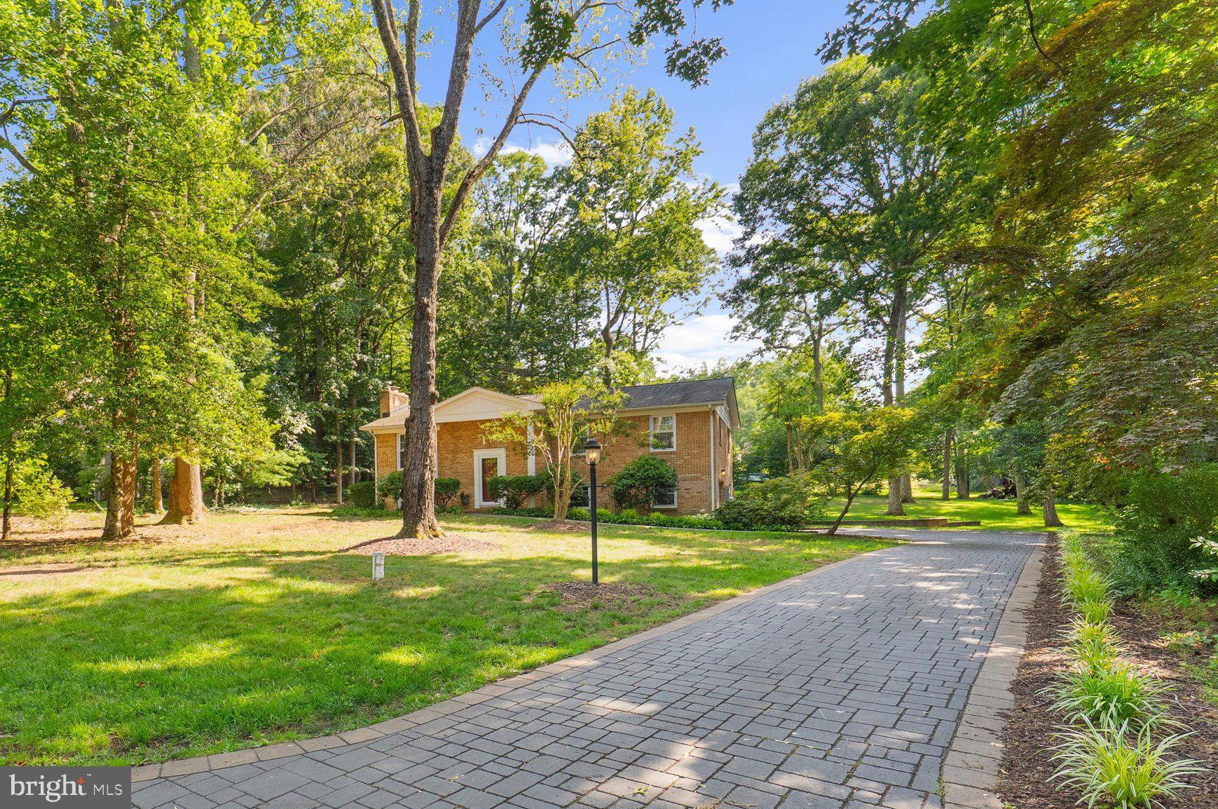 Nestled in a peaceful community with fantastic proximity, this thoughtfully updated home allows room to roam. Open concept main level anchored by a stellar kitchen - white Shaker cabinets, quartz countertops, bar seating, LG ThinQ steel appliances, steel apron front sink. Bay front living room windows allow light to pour into connected dining area. A solarium overlooks level backyard and leads to elevated deck - the perfect spots to unwind - to start - or end your day, regardless of season. 

Palatial main level primary bedroom with newly renovated en suite bath, walk in closet with custom storage. Another renovated full bath in the hall, featuring Ziegle tile tub surround - conveniently serving the second bedroom, and guests.
Lower level flex space features brick fireplace with electric insert, and walkout to covered patio area. This generous area allows for a multitude of uses - den, game room, playroom, gym, work from home / office. A large third bedroom, full bath, oversized laundry room complete the space.

Stately stamped driveway, side entry garage. Sited on over half an acre with mature tress and established landscaping. Yard allows ample space for a garden, a play set, fire pit, hammock- let your imagination run free. 


Since 2023, massive renovations including - but not limited to - completely new kitchen, new windows, carpet and LPV flooring, water heater, HVAC, washer and dryer. Attic insulation added. Two upper level bathrooms fully renovated. Exhaust fans added to all three bathrooms. Multiple light fixtures aesthetically replaced. Interior repainted. Exterior modernization, including repair of chimney, repair / replacement of trim, lights. French drain added. Multiple end of lifespan and felled trees removed. Variegated liriope planted. Back yard seeded, and regraded. Architectural grade shingle roof. 


Gingerville Manor Estates HOA includes outdoor pool, basketball half court, baseball field, pond, Pavillon with ample seating and outdoor grill- all located at 135 Tarragon Lane Multiple community events through the year. Just outside of Annapolis limits - Harbour Center is a short jaunt, as is Parole Town Center. Mere minutes from 50, 97 access. Convenient to dining, shopping, arts, and entertainment. Enjoy Edgewater, and all of Annapolis with ease! You live here.