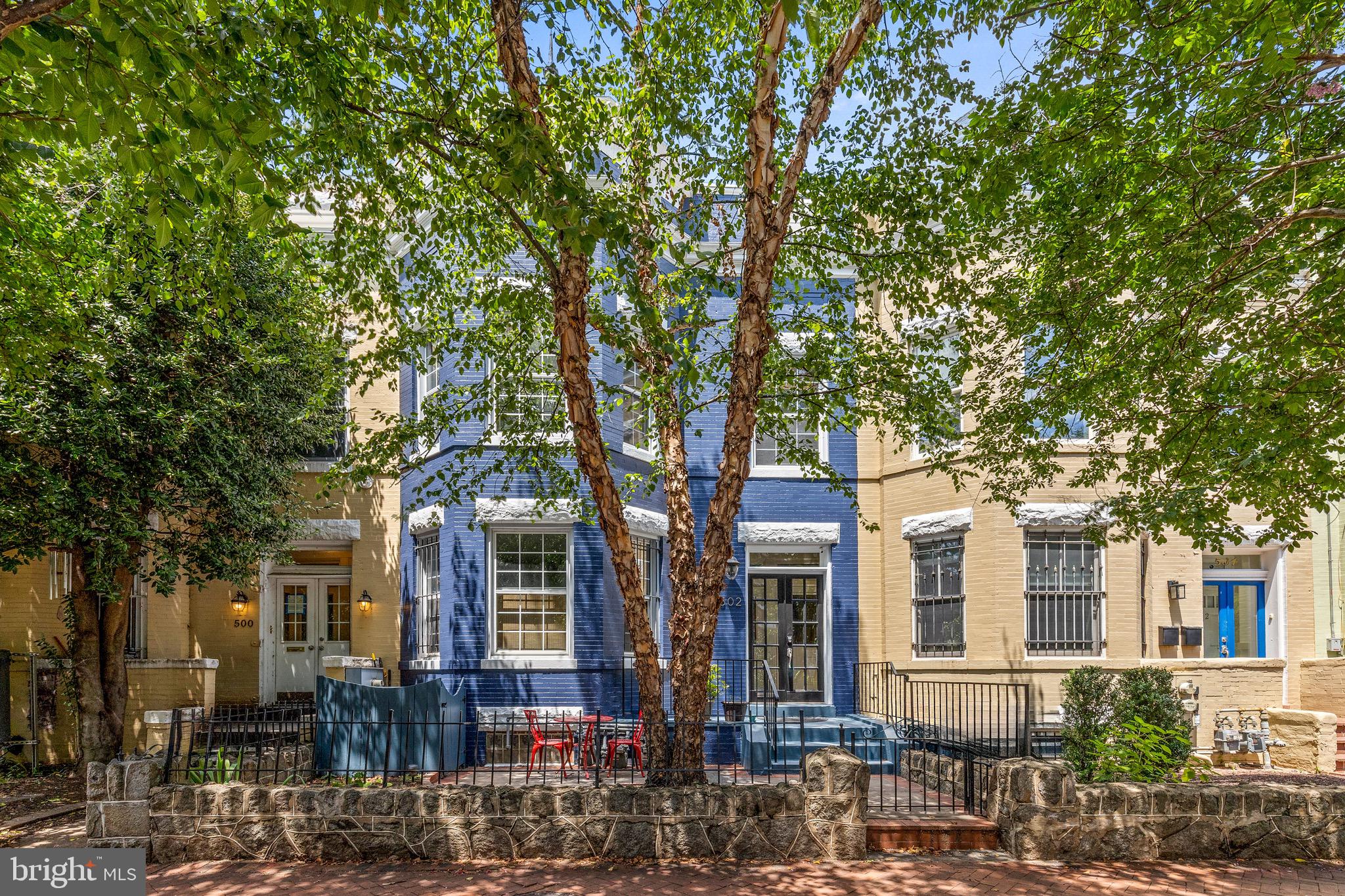 Live where the city comes alive. Just blocks from Union Station and the culinary energy of Union Market, this beautifully converted two-unit building is as much a home as it is an investment. The main-level residence is thoughtfully designed with two bedrooms, two full baths, refinished hardwood floors, and a sun-drenched living space anchored by large south-facing windows. The owner's kitchen is a standout — designer finishes, a striking tile backsplash, and a full wall of exposed brick set the tone. Step outside to a screened-in rear porch and patio, perfect for slow mornings or easy entertaining. Upstairs, the income-producing apartment mirrors the quality, adding a private terrace to its own two-bedroom, two-bath layout. Moments from H Street and everything Union Market has to offer, this is connected city living with room to exhale.
Listing Office