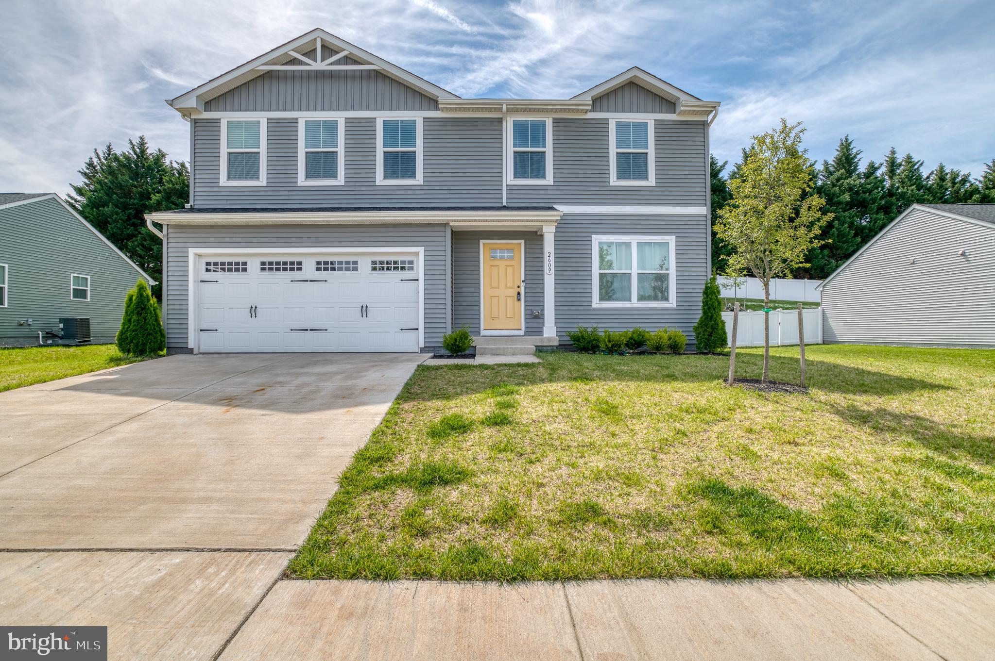 This charming Colonial-style home, built in 2024, offers a perfect blend of modern comfort and classic design. Nestled on a spacious 0.23-acre lot, the exterior features durable vinyl siding and inviting exterior lighting, creating a warm welcome. The attached front-entry garage provides convenience, while additional driveway and on-street parking ensure ample space for guests. Step inside to discover a thoughtfully designed interior that boasts four bedrooms and two and a half bathrooms. The traditional floor plan seamlessly connects the combination dining and living areas, perfect for gatherings. The eat-in kitchen, equipped with a built-in microwave, dishwasher, and electric oven/range, is a culinary enthusiast's dream. Enjoy the practicality of a pantry and the comfort of a cozy dining space. Natural light floods the home through double-pane windows, enhancing the inviting atmosphere. The primary suite features a walk-in closet and a private bath, providing a serene retreat. Additional highlights include ceiling fans for year-round comfort and convenient upper-floor laundry. Located in a vibrant community, residents benefit from nearby parks, excellent schools, and easy access to public services. Enjoy leisurely strolls in the neighborhood or engage with friendly neighbors. This home is not just a place to live; it’s a place to thrive. Experience the perfect blend of comfort, convenience, and community in this delightful property.