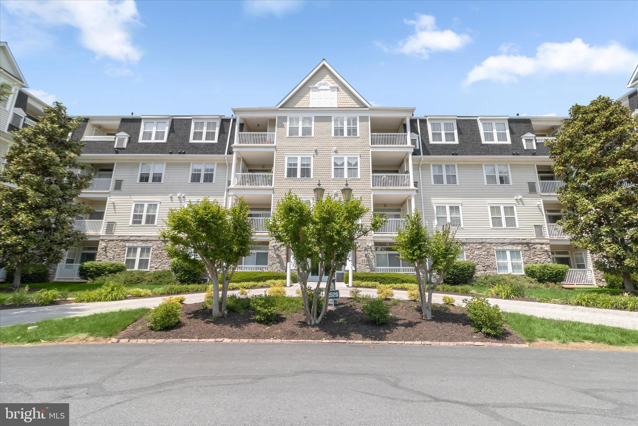 Welcome to easy living in the highly sought-after Worman’s Mill community in Frederick. This beautifully maintained first-floor condo at 2520 Waterside Drive #112 offers the perfect blend of comfort, style, and convenience with a premium wooded backdrop and private balcony overlooking the trees. Inside, the spacious living room features luxury vinyl plank flooring, elegant tray ceilings, a cozy fireplace, and direct access to the balcony, creating a warm and inviting atmosphere. The eat-in kitchen  was just remodeled with brand new kitchen cabinets and quartz countertops thoughtfully designed with ample cabinetry, sleek appliances, center island, and adjoining dining area ideal for everyday living and entertaining. The spacious primary suite offers two walk-in closets and a private en-suite full bath, while the second bedroom also includes a walk-in closet and easy access to the second full bath. A convenient laundry area completes this wonderful home. Best of all, this is not a senior living or age-restricted community, making it an excellent option for a variety of lifestyles.
Residents of Worman’s Mill enjoy a vibrant community atmosphere with beautifully landscaped streets, trails, pocket parks, gathering spaces, and outdoor concerts throughout the year. Just steps away, The Village at Worman’s Mill offers convenient dining and entertainment with local favorites including Ricci Italian Restaurant, Plaza Mexico, and ANDAZ Fine Indian Cuisine. Minutes away, Historic Downtown Frederick offers Carroll Creek, boutique shopping, breweries, restaurants, and year-round events. Nearby shopping destinations include Clemson Corner, The Shops at Monocacy, and Westview Promenade, while outdoor enthusiasts will appreciate close proximity to the Monocacy River and Riverside Park trails. Commuters enjoy quick access to Route 15, I-70, and I-270, making travel to surrounding areas simple and convenient. Experience low-maintenance living in a community that truly offers location, lifestyle, and everyday convenience.
