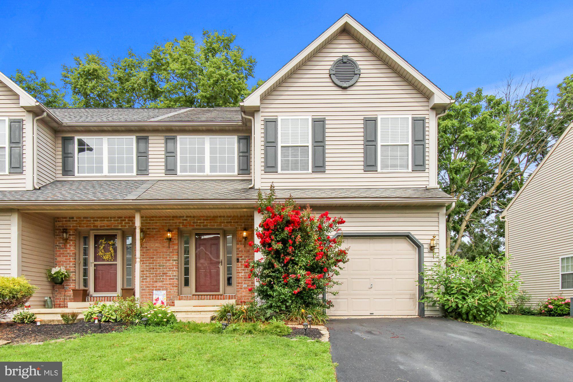 You must see this beautiful 3 bedroom, 2.5 bath semi in Wilson School District! This spacious home has a great open concept and boasts 2,852 square feet when you include the finished basement. You will love the two-story foyer which has lots of natural light, a dramatic L-shaped staircase, and new low-maintenance vinyl flooring that continues throughout the kitchen and family room. The kitchen itself is the definition of modern with updated cabinetry, stainless steel appliances, white and gray countertops including an island, gray subway tile backsplash, and a corner pantry. It even has an eat-in area that is surrounded by windows. This amazing kitchen flows seamlessly into the comfortable family room which has an electric fireplace focal point that also provides heat. A pretty powder room completes the main floor. Upstairs you will find 3 nicely-sized bedrooms and 2 full bathrooms, including a large master bedroom suite complete with vaulted ceilings, a walk-in closet, and a large master bathroom with a double sink vanity, shower, and jacuzzi tub. And did I mention the convenient second floor laundry and wide hallway? Downstairs there is even more space in the 700 square foot finished basement with recessed lighting. The outside is equally impressive with lots of room, a beautiful paver patio, and a fully fenced yard with brand new vinyl privacy fencing. This great home also offers economical gas heat, central air, a 1-car attached garage, a covered front porch, and a 1-year Cinch Home Warranty! Schedule your showing today! Seller is moving only due to job relocation, and they have just repainted the home and new carpet was installed!