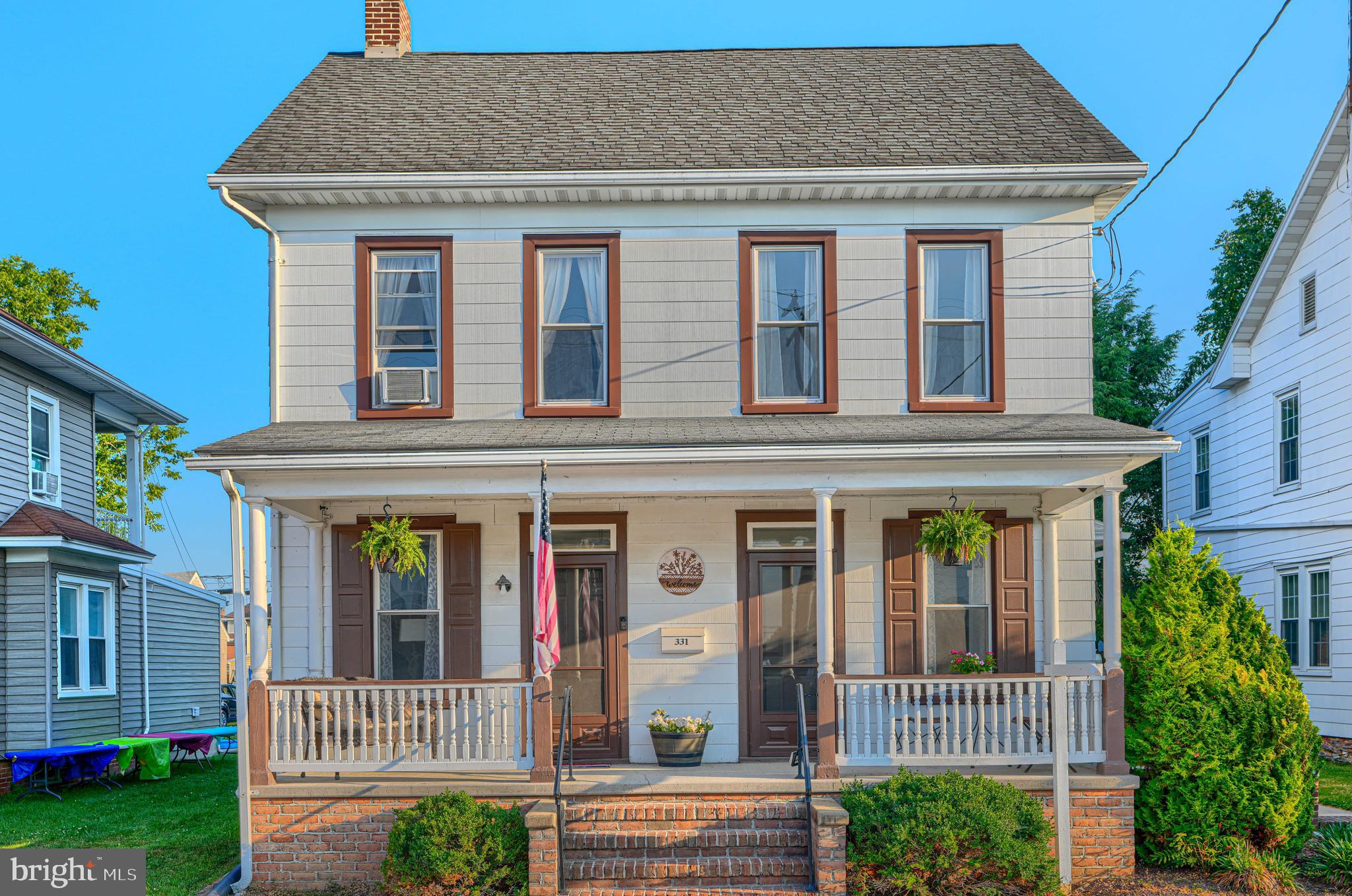 Welcome Home!  The inviting front porch will welcome you from a long day.  Enter to find brand new carpet in your large family room with a brick fireplace.  Off to the right you will end a den and dining room also with brand new carpet.  The kitchen has an area for a large kitchen table with plenty of space to host dinners!  Off the kitchen is a large sunroom with shelving, washer & dryer and access to your large fenced in backyard.  Upstairs you will find 3 bedrooms and a full bath.  Off one bedroom is access to a large attic space that could be finished for additional living space.  Don't stress about parking after a long day, you have 2 concrete parking pads plus 2 gravel parking pads, one with a gazebo cover to keep your car protected.  This one is a gem!