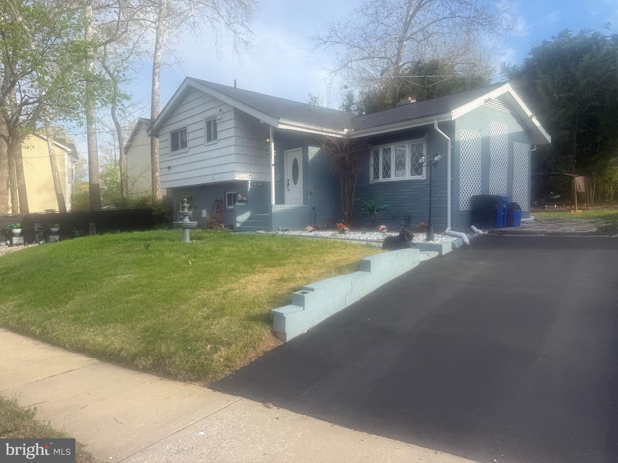 Newly Painted and Updated March 2026.   Large Spacious newly renovated split-level home in Wheaton Maryland.  Located 2 blocks  (walking distance) to the Wheaton Metro and the Westfield shopping Center.   4 levels.   Top floor Bedroom.  Main level living room,  Kitchen / Dining Room and lower level finished basement with new Laminate Flooring..  
New Roof installed May 2022.
New laminate flooring in all 3 bedrooms on top floor in hallways, living room and kitchen.  Automatic lights in all closets.  Impressive raised tile design in both the master bedroom and the main bathroom on top floor.  Open floor plan in living room with fireplace.   Ceiling fans in all bedrooms and living room.  Beautiful kitchen with updated granite countertops and stainles steel refirgerator, dishwasher and stove/oven.  Brand new Samsung stackable washer / dryer.     Giant lower level basement with new laminate flooring and  art deco doors.   Wait there's more.  The backyard is home to a giant updated deck  surrounded by polynesian tiki bamboo with new propane barbecue and large shed for storing tools and lawn mowers and personal stuff.   Additional platform deck with pergola and new outdoor wicker furniture.   Amazing end of cul de sac property.
This end of the street unit has 2 car asphalt driveway.      Solar lights adorne the house for decor and safety.     Three auto cascading fountains with lights are in the front of the house.    A side garden of light ornaments line the side of the house as you walk along the dark grey painted sidewalk to the back of the house. 

Best location. 2 blocks from the Wheaton Metro and Westfield shopping center where Costco, Target, Macy, the Giant, Wells Fargo, Starbucks and more are walking distance to the house.    Adjacent to the house is a park with a children's slide and a place to play.  Albert Einstien High School is one block to the right.    Each weekend it is open to the public to walk or bike in their school fields.     Fireworks are held at the Einstein High School each July 4th for Montgomery  County.     Wheaton Regional Park and numerous shopping centers along Georgia avenue are conveniently located minutes from the house.     Incredible restaurants are within a  5 minute drive.  Located close to Rockville, Bethesda, downtown Silver Spring.   This may be the best location  for a house ever.    Come see this house soon. It will go fast.  It is being sold "as-is" .  Large backyard and front yard.    A great place for you!!   Home warranty included for new owner.  Newly renovated March 2026.