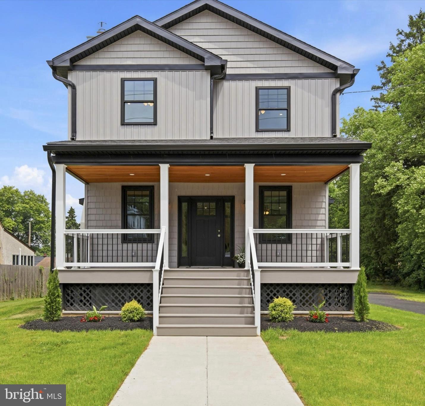 Completely reconstructed and thoughtfully reimagined, this stunning Craftsman style Colonial blends the character of a 100 year old home with the quality and efficiency of modern construction. Situated on one of the largest lots in the neighborhood, this 4 bedroom, 3 full bath home offers approximately 2,200 square feet of beautifully finished living space in the highly rated Upper Dublin School District. A welcoming covered front porch leads to an interior featuring white oak hardwood floors, Craftsman style trim, solid wood doors, recessed lighting, and a living room with custom built ins and a gas fireplace showcasing the original bluestone mantel. The eat in kitchen features GE appliances, soft close cabinetry, ample pantry space, and access to the covered rear patio. A soundproofed first floor office, full bath, and mudroom add flexibility and convenience.

Upstairs, the newly constructed second floor offers a spacious primary suite with a walk in closet and ensuite bath featuring marble tile and granite countertops. Three additional bedrooms share a thoughtfully designed hall bath with a split layout that separates the double vanity from the private shower and toilet area. A second floor laundry room adds everyday convenience. This exceptional property offers the peace of mind of virtually all new construction, including a new second floor, roof, board and batten siding, windows, HVAC, plumbing, electrical, chimney, and copper water service line. Additional highlights include dual zone HVAC, a full basement with 7.5 foot ceilings and outside access ready for future finishing, and a gorgeous covered rear patio featuring a pine ceiling, ceiling fan, and TV ready electrical overlooking the expansive backyard. Conveniently located near Routes 309, 276, and 476, with SEPTA Regional Rail nearby and downtown Ambler's shops, restaurants, and entertainment just a short walk away.