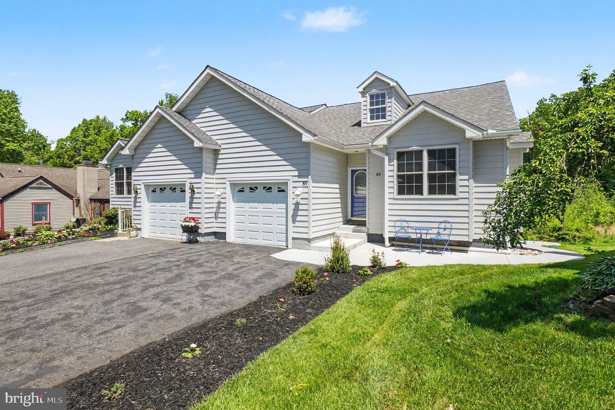 COMPLETELY move-in ready! Situated in the sought-after community Chesapeake Bay Golf Club, beautifully maintained 2-bedroom, 2 bath semi-detached rancher offering 1,400 sq. ft. of living space with close proximity to Rt 40, I-95, Harford County and the shops and restaurants of the quaint and historical town of North East, Maryland. Highlights include an open and airy floor plan with 9' ceilings and crown molding throughout. Living room details include striking hardwood flooring and a cozy propane burning fireplace with a mantel. Hardwoods continue in the adjacent dining area featuring a bay window providing scenic views and tons of natural light. Kitchen features include ceramic tile flooring, stainless-steel appliances, pantry, sleek granite countertops and a peninsula with seating. Additional details include laundry, 2 bedrooms, including a primary with an attached bath and walk-in closet, as well as an additional full bath. The full poured concrete basement includes professional waterproofing (Basement Systems USA), rough-in bath plumb and sliders leading to the rear yard and patio, offering plenty of room for adding additional living space if desired. Additional property highlights include an attached one-car garage and professional landscaping. Upgrades include an architectural shingled roof added 2025, HVAC (2020), basement professional waterproofing (11/2024) and new sidewalks and patio added 10/2025. HOA fees are$138.00 monthly and include lawn maintenance, trash, exterior insurance and snow removal. Chesapeake Club Road Association Dues are $150.00 yearly (see docs for more HOA info). If you are searching for a turn-key home located in a peaceful and friendly community, your search is over... 89 Ridge Run Road... A PERFECT place to call HOME!