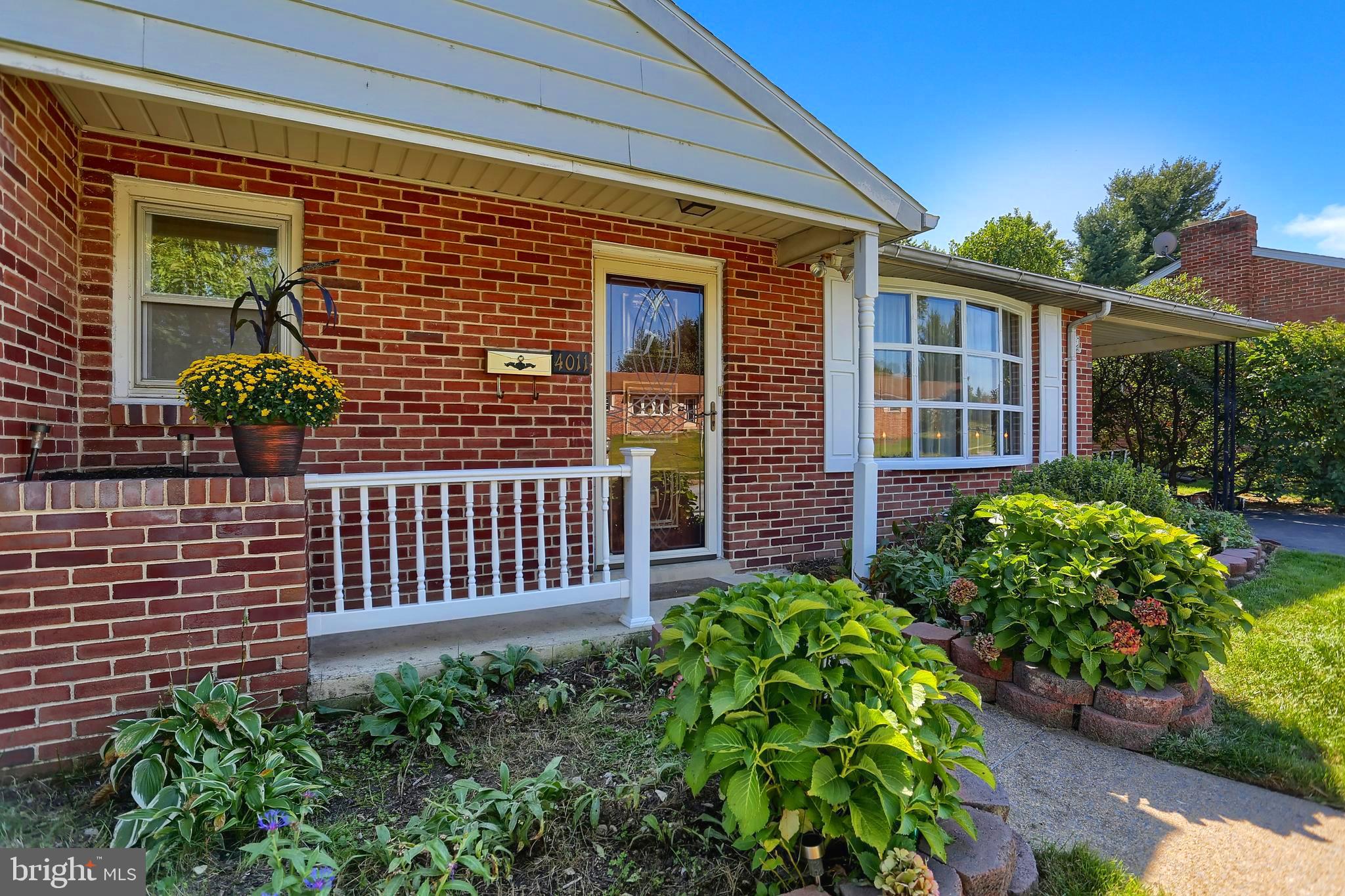 Move In Ready 3 bedroom 2 bathroom brick ranch house with central air and fenced back yard! Family room in basement with wood burning fireplace and second bathroom. Plenty of storage with additional storage room in the basement, workshop area, and attic. Heat Pump has back up oil furnace which will kick on when it is below 25 degrees outside. Pellet stove is an optional heat source.  There is also a generator outlet with transfer switch.