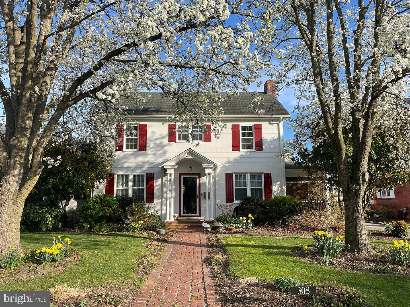 Welcome to 308 Glenburn!  This  is a  classically-designed 2,284 SF house surrounded by a multitude of glorious lush gardens on .26 of an acre!  308 is a lovely 4 bedroom, 2.5 bath home, served by central air conditioning and brand new windows throughout.  308 showcases a beautiful sunny living room with a charming wood-burning fireplace and a  great screened-in porch just off the living room.  Additionally, the house offers a gracious dining room with a cozy den/office located just off the dining room.   The inviting updated kitchen is large and well laid out with great appliances and  a sunny bonus/office room behind  the kitchen, which leads to the back yard.  Thee laundry room is located conveniently just off the kitchen.  
The second floor boasts 4 well-sized bedrooms and 2 updated bathrooms.  The third floor is reached by built-in steps and has great potential for 
serving as additional living space if desired.  Additionally, the house has a spacious attached 2-car garage with new remotely-controlled garage  doors.  The back yard hosts a large, useful garden shed sited amongst beautiful gardens.  This beautiful classic house is located on a wide gracious street in Cambridge, just a few blocks from the banks of the mighty Choptank River and the Cambridge Yacht Club.   If walkability to downtown restaurants and shops  is of interest to you this is the ideal location.  Please  consider  joining in the ongoing renaissance taking place in Cambridge, MD!
