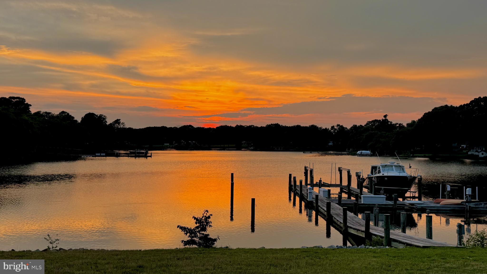 Miles Away on Murphy’s Point – Discover an unparalleled waterfront retreat at 28092 Glebe Rd, Easton, MD, nestled on approximately ±2.7 picturesque acres. Thoughtfully designed for entertaining, relaxation, and convenient living, this luxurious estate offers expansive indoor and outdoor spaces, exceptional waterfront amenities, and easy access to nearby towns, beaches, and metropolitan areas.

With impressive construction and thoughtful expansion, this property promises both comfort and elegance. The estate blends serene rural charm with unmatched convenience, situated just minutes from the vibrant heart of historic Easton. Known for its rich cultural scene, charming boutiques, award-winning restaurants, and year-round events, Easton offers residents a sophisticated yet laid-back lifestyle on Maryland's coveted Eastern Shore.

This expansive estate features generous open spaces perfect for gatherings, multiple luxurious bedroom suites, a dedicated theatre room, versatile office spaces, and two substantial garages flanking the home—accommodating up to eight vehicles. Outside, the property unfolds into a private paradise with meticulously landscaped grounds, inviting outdoor living spaces surrounding the waterfront pool, a complete pool house, and a waterside firepit ideal for enjoying stunning sunset views.

Exceptional elevation provides sweeping northwest views over Glebe Creek, complete with a private pier and boat lift, offering easy navigation to the Miles River and the iconic waterfront town of St. Michaels. Whether you're exploring the charming streets of Oxford or dining along historic waterfront, this location places you within a short, scenic drive or boat ride of  the Eastern Shore's  finest towns and attractions.

Built in 1995 by Bay Country Builders, this impressive home was thoughtfully expanded in 2001 by renowned Lundberg Builders, resulting in approximately ±7,366 square feet of luxurious yet comfortable living space. With 7 bedrooms, 8 full baths, and 2 half baths, the layout is ideal for hosting guests and multi-generational living, while remaining easy to maintain.
Strategically located, this estate is just a short drive from Route 50, connecting residents to nearby beaches such as Ocean City and Rehoboth Beach, as well as major metropolitan areas including Annapolis, Baltimore, and Washington D.C. Additionally, convenient access to Easton Airport (ESN) makes travel effortless. Come home to Miles Away on Murphy’s Point—a rare opportunity to embrace Eastern Shore living at its finest.