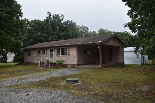 ***OPEN HOUSE: SATURDAY JULY 11TH 12-2PM***
Opportunity awaits on 3.67 peaceful acres! This ranch-style home offers 3 bedrooms, 1.5 bathrooms, and endless possibilities for buyers looking to update, renovate, or personalize a property with acreage.
Inside, you'll find a functional floor plan featuring a country kitchen with refrigerator, range, washer, and dryer conveying with the sale. An attic provides additional storage, while the detached outbuilding and storage sheds offer space for equipment, hobbies, or a workshop.
Enjoy the privacy and flexibility of a spacious lot with room for gardening, outdoor recreation, or future improvements. A gravel driveway and attached carport provide convenient parking.
Ideally located approximately 5 miles from commuter rail access, this property offers a peaceful setting with convenient access to surrounding communities. With no HOA, you'll appreciate the freedom to make this property your own.
Bring your ideas and imagine the possibilities this country property has to offer. Sold As-Is.
