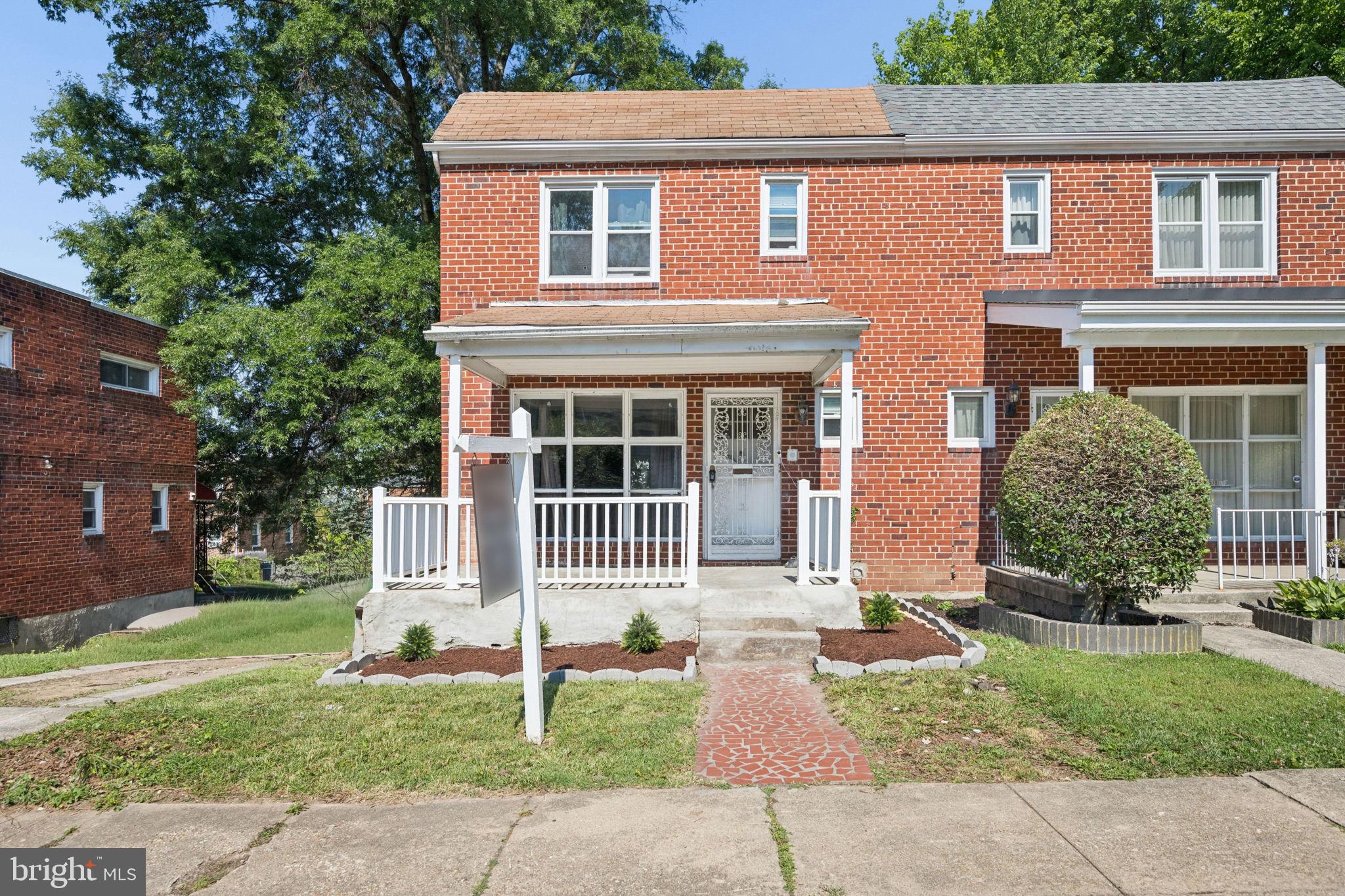 Adorable semi-detached 3BR/2BA brick Townhome located on a quiet street in Govans.  Park just steps from the covered front porch and the door to your new home. Step inside a home offering three floors of living space, abundant natural light, luxury flooring, and a warm color palette.  The main floor offers a large living room, a dining room, and a kitchen.  The kitchen boasts ample cabinetry, stainless steel appliances, and a stainless steel sink.  On the second floor are two sizable secondary bedrooms, a larger primary bedroom (all with hardwood floors), and a recently remodeled full bathroom.  The finished lower level offers additional living space, featuring a full bath with a walk-in shower, a large recreation room, laundry, utilities, and a walk-out to a covered patio. From the kitchen step outside onto a spacious covered patio that overlooks a yard filled with possibilities.  This home is ideal for any new homeowner and is close to shopping, restaurants, and commuter routes.