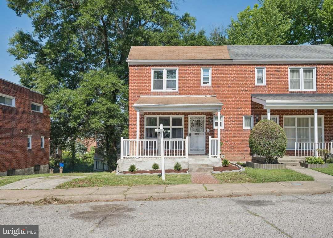 Adorable semi-detached 3BR/2BA brick Townhome located on a quiet street in Govans.  Park just steps from the covered front porch and the door to your new home. Step inside a home offering three floors of living space, abundant natural light, luxury flooring, and a warm color palette.  The main floor offers a large living room, a dining room, and a kitchen.  The kitchen boasts ample cabinetry, stainless steel appliances, and a stainless steel sink.  On the second floor are two sizable secondary bedrooms, a larger primary bedroom (all with hardwood floors), and a recently remodeled full bathroom.  The finished lower level offers additional living space, featuring a full bath with a walk-in shower, a large recreation room, laundry, utilities, and a walk-out to a covered patio. From the kitchen step outside onto a spacious covered patio that overlooks a yard filled with possibilities.  This home is ideal for any new homeowner and is close to shopping, restaurants, and commuter routes.