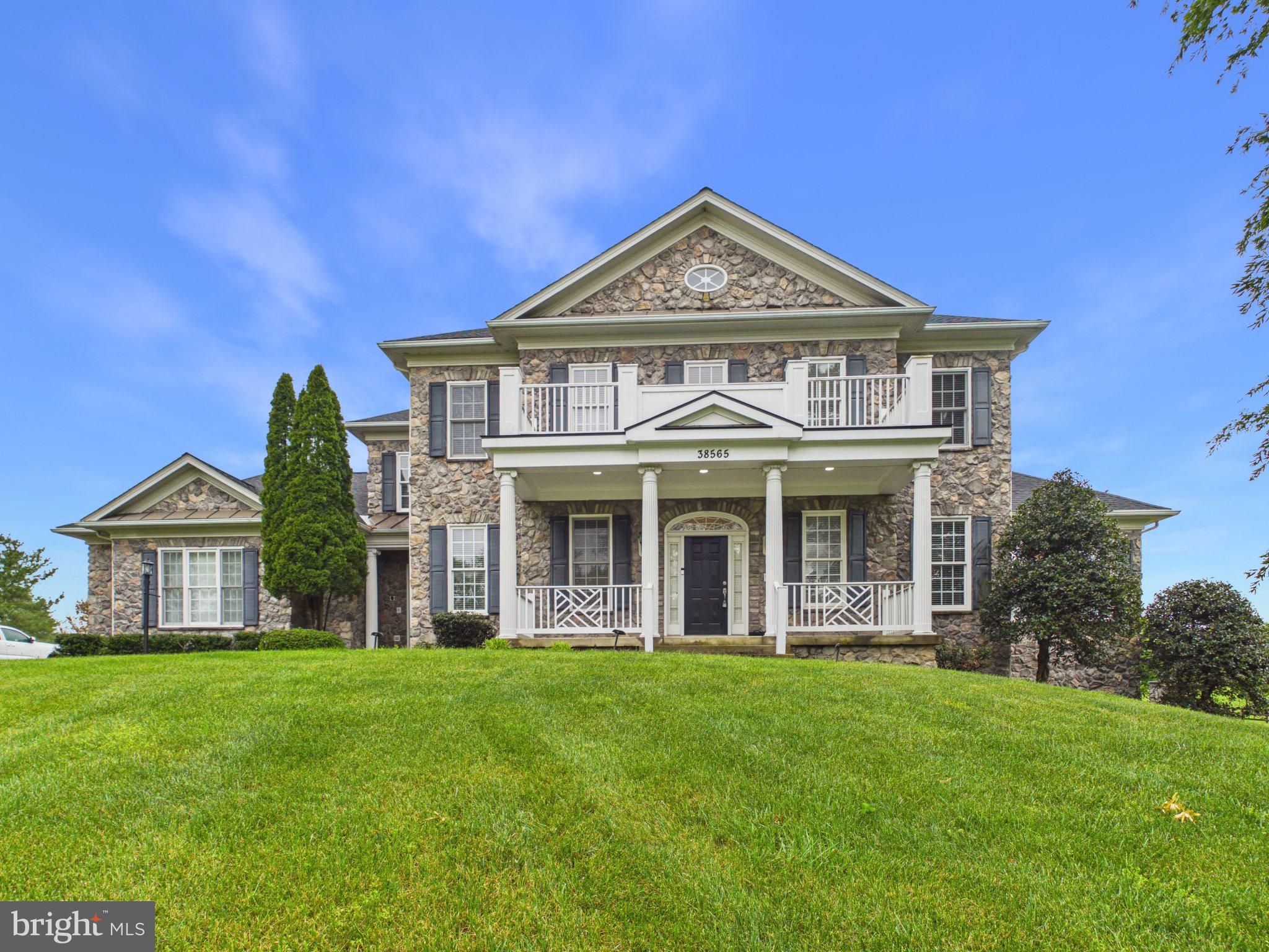 Welcome to Hamilton, Loudoun County — Experience Timeless Elegance in Heather Knolls
Discover beautiful craftsmanship and outstanding living in this exquisitely appointed masonry home, located in Heather Knolls, one of Hamilton’s most exclusive estate communities. Set on 3.06 private acres, this distinguished residence offers over 5,042 finished square feet, featuring 4 bedrooms, 1 den, 4 full baths, and 1 half bath—all with no HOA. Recently painted and meticulously maintained, the home blends refined elegance with everyday functionality.
Main Level
The main level impresses with 10-foot ceilings, a formal dining room to the left, a formal living room to the right, and a spacious main‑level office. The chef’s kitchen includes:
Stainless steel appliances,
Large quartz island
Stylish backsplash
Under‑cabinet lighting
Casual dining nook
Stone archway opening to the family room
The inviting family room features a stone gas fireplace and access to the new screened‑in Trex deck  overlooking the new stone patio with outdoor fireplace. and a nice sunroom backing to a backyard view.
Upper Level
Upstairs, 9-foot ceilings enhance the sense of space. The luxury owner’s suite includes:
Tray ceiling
Second two sided fireplace shared with the sitting room
Backyard views
Fully renovated primary bath with separate soaking tub and oversized shower
Huge walk‑in closet
The upper level also offers a bedroom with private en‑suite bath, plus two generously sized bedrooms connected by a renovated Jack‑and‑Jill bath (2020).
Lower Level
The walk‑out lower level features LVP flooring (installed 2 years ago) and includes:
Large recreation room
Relocated wet bar redesigned into an open kitchenette
Wall tile and fireplace added where the original wet bar stood
Full bedroom and full bath
Theatre room
Gym room (installed 2023) with mirrors, fresh paint, and rubber flooring
Exterior & Systems
Roof replaced approx. 2 years ago, Nice size shed
HVAC, water heater, and water system serviced annually
Spacious side‑load 3‑car garage
Long private driveway with exterior lighting
Located in a rare, peaceful enclave of only 21 estate homes
All just minutes from Leesburg, fine dining, boutique shops, and Northern Virginia’s world‑renowned wineries and breweries.