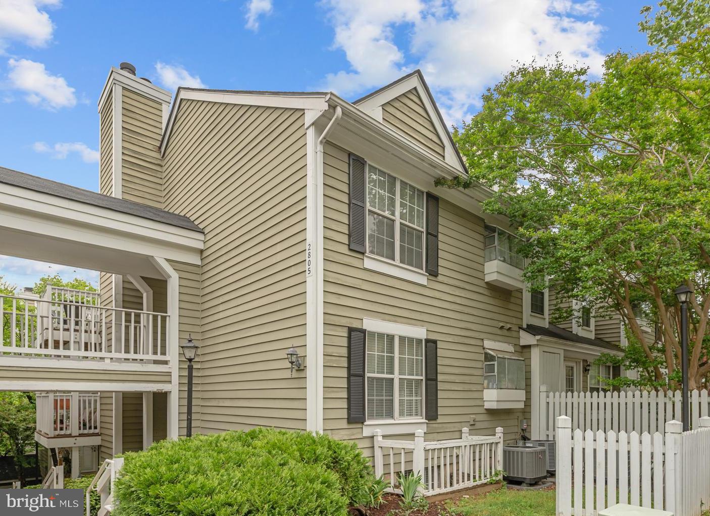 Welcome home to Courtbridge, a sought-after community nestled in the heart of Shirlington. Updated throughout with modern finishes and thoughtfully designed for comfortable living, this condo is truly move-in ready. A convenient pass-through connects the sunny dining room to the kitchen, where stainless steel appliances and sleek granite countertops await. Anchoring the main living space, a sunken living room features a cozy wood-burning fireplace and generous windows that flood the space with natural light, with direct access to a peaceful covered balcony surrounded by mature trees for both privacy and shade. The generously sized primary suite features a private sitting area, plush carpeting, and a large walk-in closet with a custom closet system - complemented by an en suite bath with a handsome vanity and modern finishes. Situated just off the living room, the second bedroom is ideal as a home office, guest room, or whatever suits your needs - with a second full bath nearby creating a flexible and comfortable arrangement for guests or roommates. In-unit laundry rounds out this beautifully updated home. This popular community offers two parking permits and an outdoor pool to enjoy all Summer long! Just minutes to Harris Teeter, the Village at Shirlington, Shirlington Dog Park, Four Mile Run Park and Trail, Old Town Alexandria, Mark Center, Amazon HQ2, and The Pentagon. Quick access to I-395, I-495, Route 7, Columbia Pike, Glebe Road, and Route 66, with easy reach to Reagan National Airport. Don't miss your chance to call Courtbridge home - schedule your showing today!