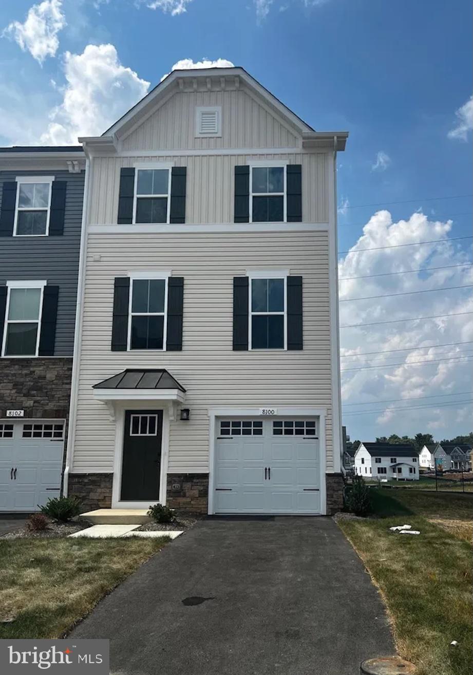 Built in 2023, this stunning end-unit townhome in the highly sought-after Wellington Farms community offers over 2,425 sq. ft. of modern living space across three finished levels with 9 feet ceilings  4 bedrooms, 3 full baths, and 1 half bath. The open-concept main level is filled with natural light and features a spacious living area and a gourmet kitchen with quartz countertops, stainless steel appliances, upgraded backsplash, pendant lighting, and a large center island. Sliding glass doors lead to a spacious 20-foot deck, perfect for entertaining.
Upstairs, the luxurious primary suite features a tray ceiling, dual vanities, and a spa-like shower with built-in seating, while the convenient bedroom-level laundry includes energy-efficient front-load washer and dryer. The entry-level bedroom with a full bath offers flexibility for guests, a home office, or multi-generational living.
Situated at the end of a cul-de-sac and adjacent to community open space, this premium end-unit offers added privacy. Additional features include a one-car garage with EV charging plug and driveway parking for two vehicles.
Residents enjoy Wellington Farms amenities including a pool, clubhouse, fitness center, playgrounds, and walking trails, all within highly rated Howard County schools and minutes from Rt 29, Rt 216, and I-95 for easy access to Baltimore and Washington, DC.