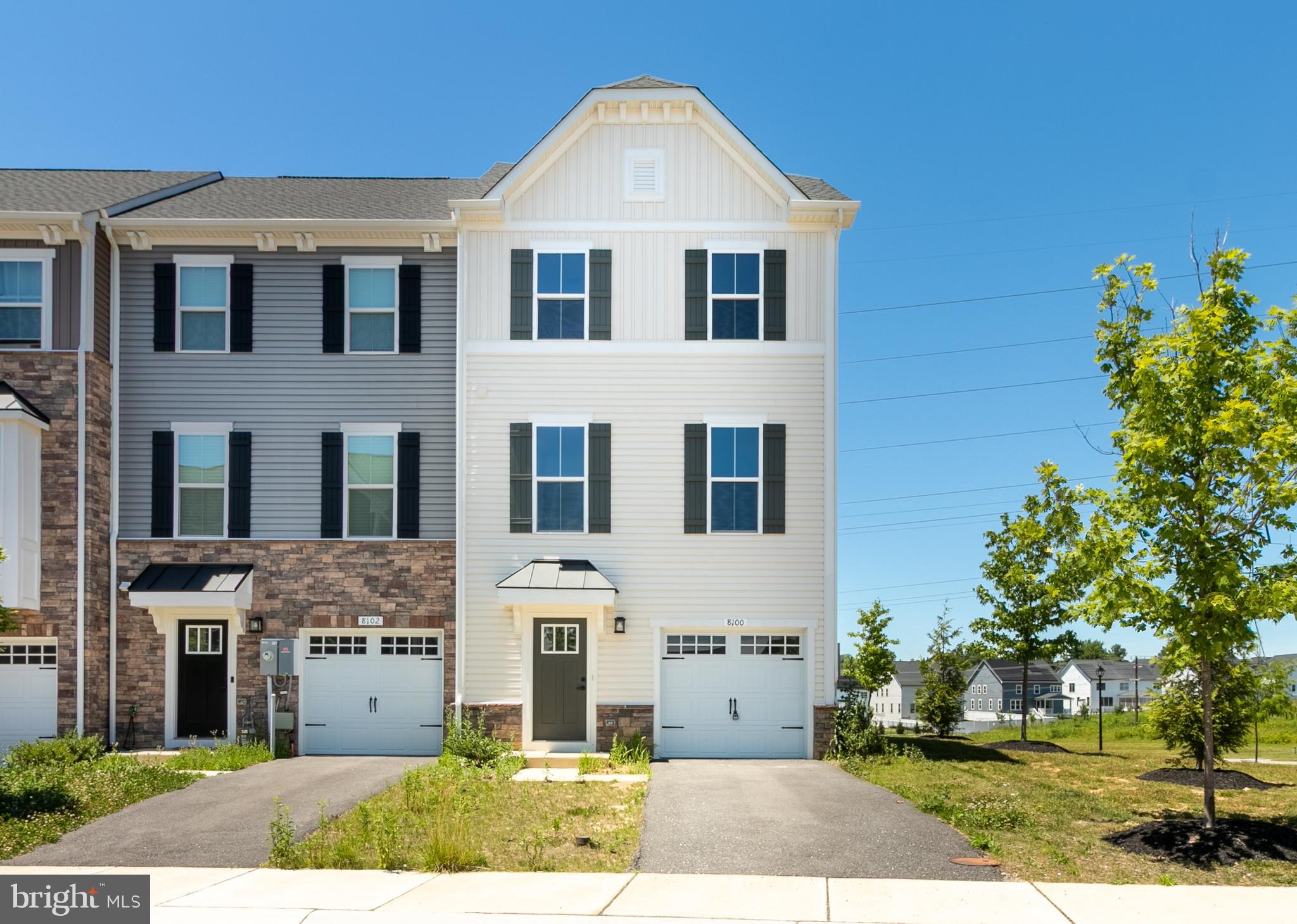 Built in 2023, this stunning end-unit townhome in the highly sought-after Wellington Farms community offers over 2,425 sq. ft. of modern living space across three finished levels with 9 feet ceilings  4 bedrooms, 3 full baths, and 1 half bath. The open-concept main level is filled with natural light and features a spacious living area and a gourmet kitchen with quartz countertops, stainless steel appliances, upgraded backsplash, pendant lighting, and a large center island. Sliding glass doors lead to a spacious 20-foot deck, perfect for entertaining.
Upstairs, the luxurious primary suite features a tray ceiling, dual vanities, and a spa-like shower with built-in seating, while the convenient bedroom-level laundry includes energy-efficient front-load washer and dryer. The entry-level bedroom with a full bath offers flexibility for guests, a home office, or multi-generational living.
Situated at the end of a cul-de-sac and adjacent to community open space, this premium end-unit offers added privacy. Additional features include a one-car garage with EV charging plug and driveway parking for two vehicles.
Residents enjoy Wellington Farms amenities including a pool, clubhouse, fitness center, playgrounds, and walking trails, all within highly rated Howard County schools and minutes from Rt 29, Rt 216, and I-95 for easy access to Baltimore and Washington, DC.