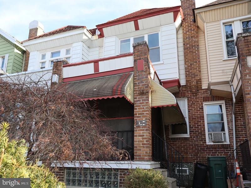 This 2-story brick row home, built in 1915, is located in Germantown of Philadelphia. The property features an front porch, a spacious living room, dining room and a kitchen walkout access to a small landing The upper level includes 3 sizable bedrooms and a three-piece hall bath. The unfinished basement a powder room and walkout access to one-car garage and driveway parking. The property is conveniently close to area parks, shopping, and public transportation, a short drive to highway access Center City via the Drives.