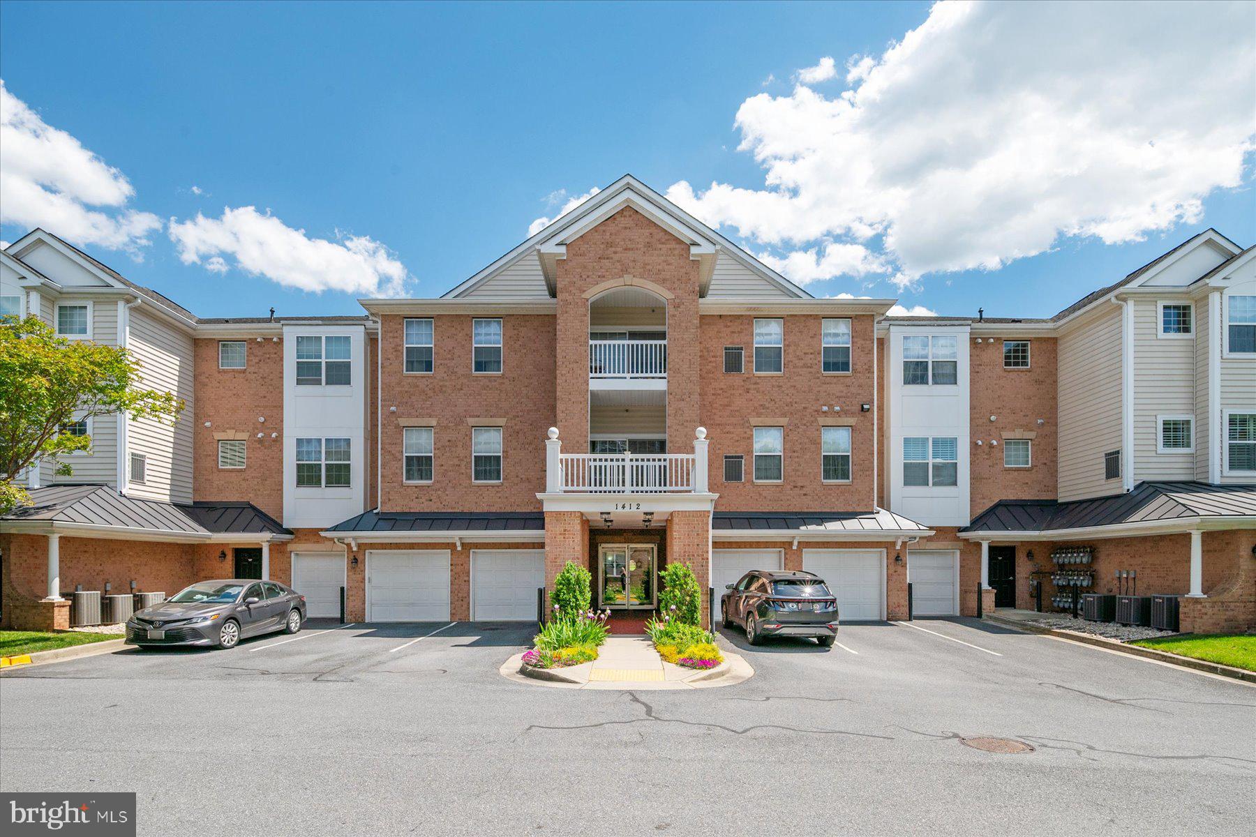 Welcome to carefree living in the sought-after Carroll’s Creek 55+ community! This spacious single-level condominium is located on the third floor with convenient elevator access and offers 1,782 square feet of thoughtfully designed living space. Freshly painted and well-maintained, this 3-bedroom, 2-bath residence features light-filled living and dining areas enhanced by crown molding, upgraded LVP flooring, and private balcony access. 
The kitchen is equipped with granite countertops, tile backsplash, updated stainless steel appliances, and ample cabinetry. The spacious primary suite includes a walk-in closet and a renovated bath featuring a double vanity and oversized custom-tiled shower. Additional highlights include in-unit laundry, a secure-access building, and an oversized corner 1-car garage with parking pad.
Residents of Carroll’s Creek enjoy community amenities including a clubhouse, pool, and fitness center. Ideally located close to shopping, dining, and entertainment at Waugh Chapel Towne Centre, with easy access to major routes, this home combines comfort, convenience, and vibrant community living.