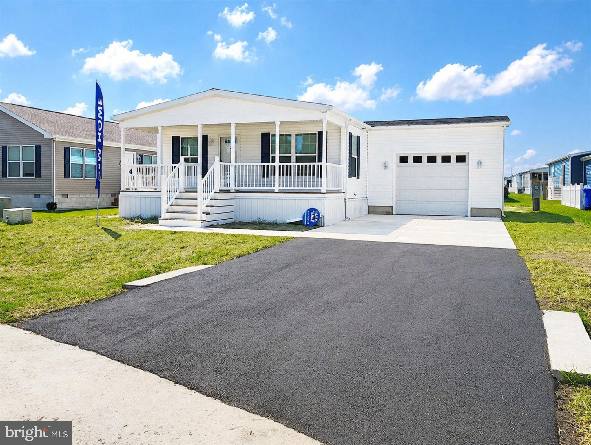 Beautiful Brand New 3BR Home in 55+ Sussex West. Contemporary style and built on energy efficiency and sustainability, our smarter beach homes focus on open floor plans, large windows, charming details and high-end finishes. Find luxury vinyl plank throughout, spacious living/dining/kitchen areas, gourmet kitchens with islands, beautiful stainless-steel appliances featuring natural gas cooking to keep the chef happy. Other features include pendant lights and recessed lighting, deep sinks, sparkling backsplashes, and generous primary bedrooms with huge walk-in closets and ensuite baths. Utilize the two additional guest rooms as your home gym, office or crafting space. Additional full bath and handy laundry/mud room complete the floor plan. These homes have a one car garage and off-street parking for two cars. Explore Sussex West, an active adult community with mature trees and amenities that include a beautiful clubhouse, heated indoor pool, dog park, pickle ball and shuffleboard (coming in 2025), bocce ball court and a horseshoe pit. Snow removal and recycling are included with your land lease, and you will enjoy community sponsored events and an onsite management team. Live a short drive to tax-free outlets, unique shops, world-class restaurants, and only five miles from the shops on Lewes’ Second Street. Perfect as your summer getaway or as your year-round residence, live your life in Sussex West, and live close to all that life in Delaware has to offer.

Our Land Lease Amenity Package Includes:
Clubhouse
Weekly Activities & Monthly Events
Indoor Salt-Water Swimming Pool w/Chair Lift & Shower Facility
Neighborhood Newsletter
Dog Park
Bocce Ball Court
Horseshoe Pit
Lewes to Georgetown Trail Access
Off Street Parking
Pets (2) Welcome
RV Storage (Fee)
Covered Mailboxes
Street Lights
Snow Removal
Clubhouse Rental
On-Site Management & Maintenance
On-site Sales Office with Home Listing Service
State-of-the-Art Security Camera System
Pickleball & Shuffleboard – Coming This Year