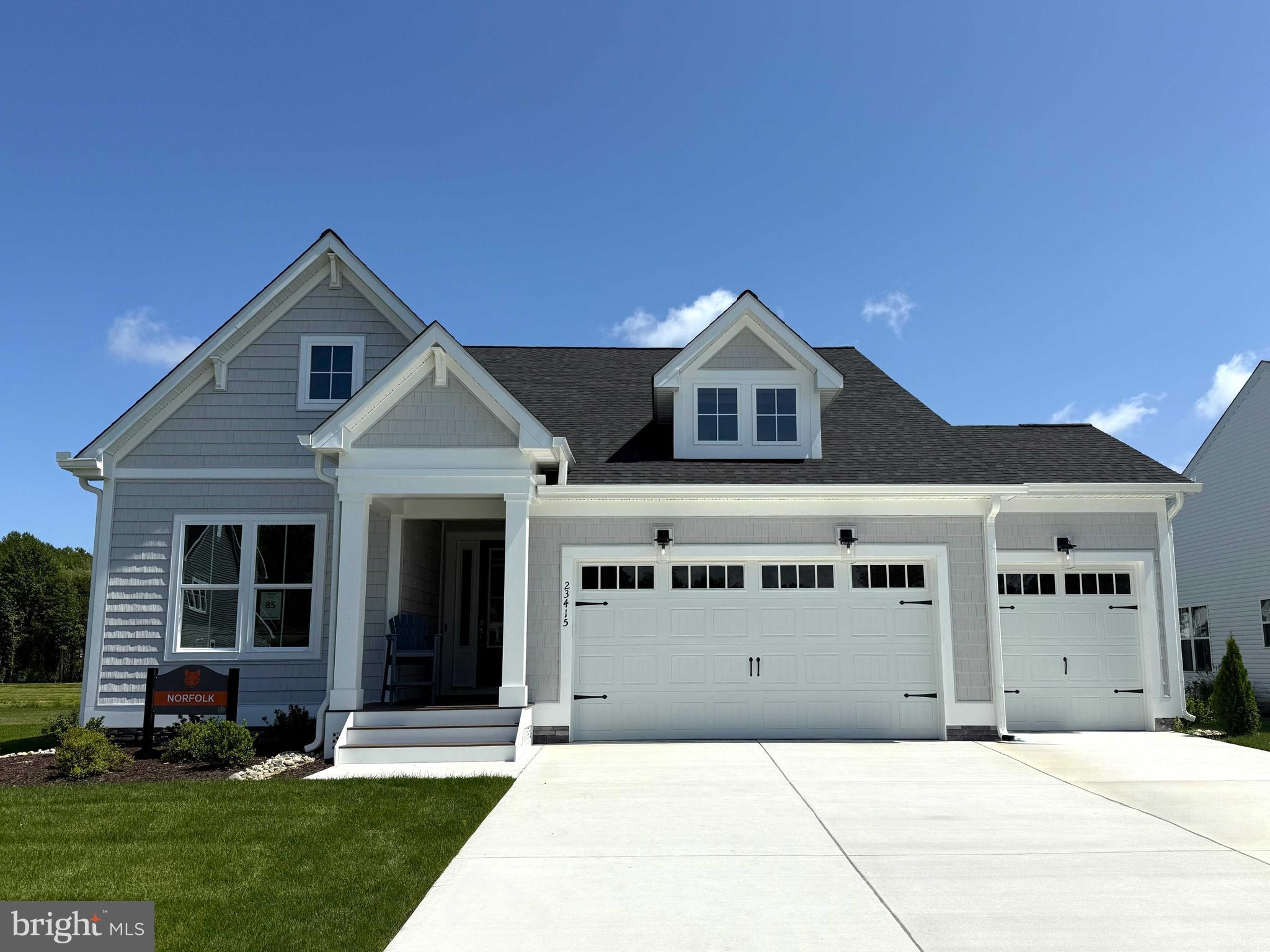 To Be Built: The Norfolk model on Homesite 30 at 32253 Solara Way in the boutique Suncrest community of Lewes, Delaware offers thoughtfully designed main-level living in an intimate coastal setting of just 36 homesites.

The Norfolk floor plan by Foxlane Homes starts at over 2,000 square feet and offers 3 to 4 bedrooms, 2 to 3 bathrooms, and a 2- to 3-car garage. Designed for comfort and convenience, the heart of the home is the open-concept kitchen with a large center island, seamlessly connecting to the dining area and great room—creating the perfect space for gathering and entertaining.

The main-level living design provides everyday ease, while optional second-floor living space offers the flexibility to add a loft, additional bedroom, and full bath, creating a private retreat for guests or extended family.

Suncrest is designed for those seeking a quieter, boutique-style coastal lifestyle. Community amenities include pickleball courts, a bocce ball court, and a cozy gathering area around a fire pit, while leaving plenty of space for homeowners to create their own backyard oasis.

Located just minutes from Lewes’ beaches, dining, shopping, and historic downtown, Suncrest offers the perfect blend of privacy, convenience, and coastal charm.