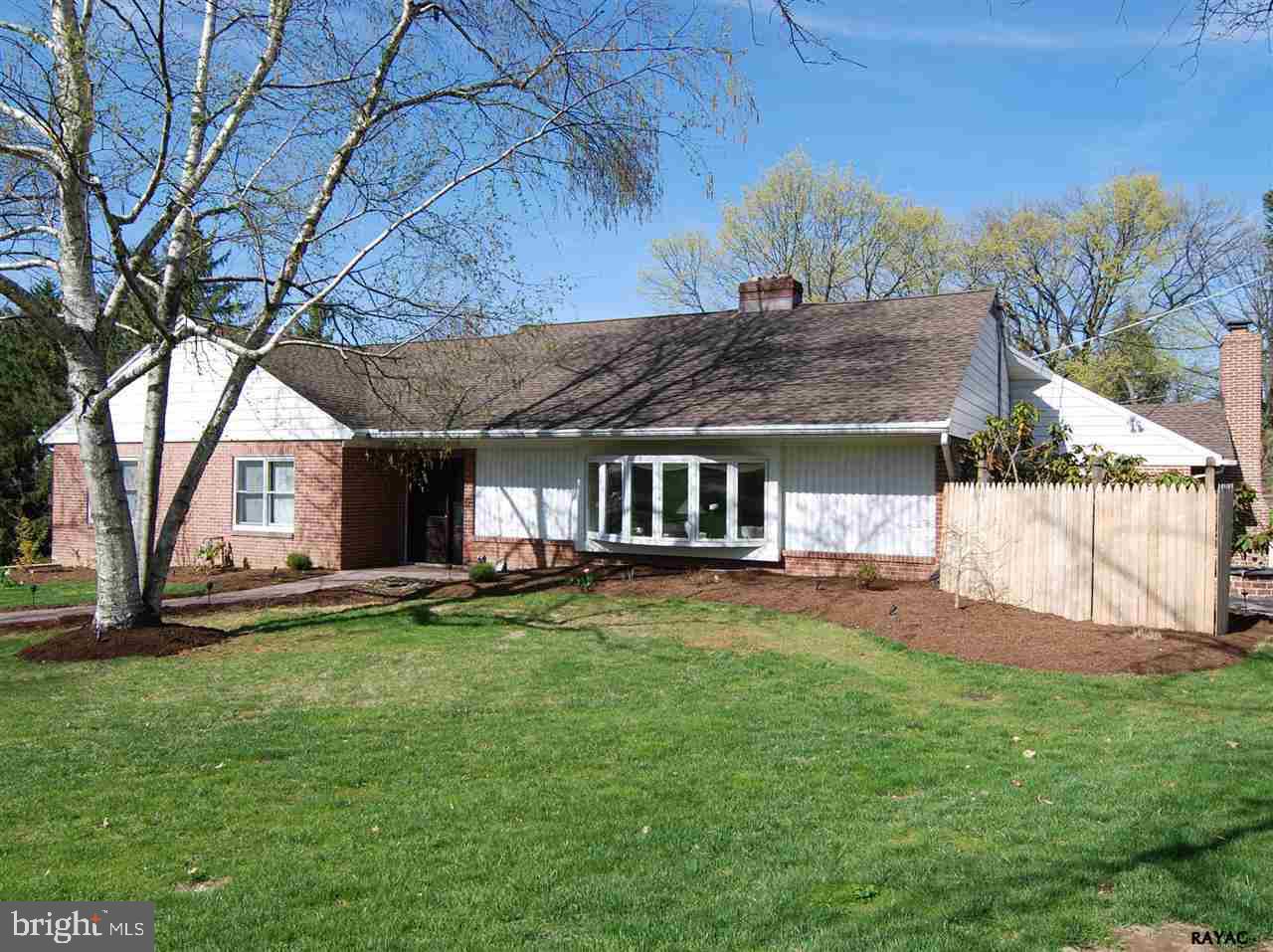 Enjoy one floor living in this majestic and spacious brick Ranch home.  Situated on almost half an acre, enjoy 3 BRs 3FBs, Finished LL w/Rec Room.  Great Room with vaulted ceilings,  walls of windows,  Wood FP opens to updated Kitchen; access to Patio areas and rear gardens.  Master BR w/updated Full Bath.  One floor living at its finest. York Suburban Schools