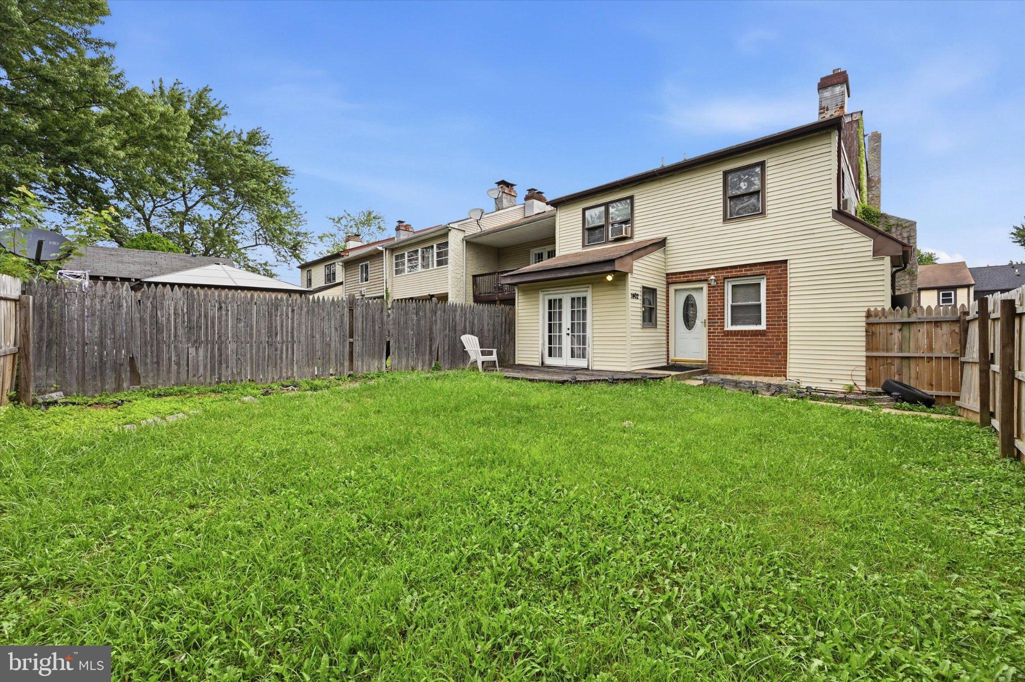 Welcome to 1402 Flanders Way, an exceptionally well-positioned end-unit townhome in Newark, Delaware! Offering 3 bedrooms, 1.5 baths, approximately 1,250 square feet of living space, and a location that truly sets it apart, this home combines privacy, outdoor space, convenience, and value.

One of the standout features is the additional sunroom installed off the rear of the home and connected directly to the deck, creating additional space to relax, entertain, or enjoy views of the backyard. Step outside to your own fully fenced private yard—an increasingly hard-to-find feature in townhome living. Even better, the property is positioned adjacent to a huge open grass field maintained by the county, giving this home a uniquely open setting with expansive green space right outside your door.

Inside, the home offers a functional two-story layout, fireplace, basement, and plenty of opportunity to make the space your own. The end-unit positioning provides an added sense of separation and makes this one of the most desirable locations within the community.

Location is another major advantage. Situated in the heart of Newark's 19702 corridor, 1402 Flanders Way provides convenient access to abundant shopping, restaurants, grocery stores, entertainment, and everyday necessities, along with quick connections to Route 40, Route 1, Route 273 and I-95. Christiana Mall, Christiana Fashion Center, University Plaza, the University of Delaware, and the greater Newark and Christiana employment corridors are all within easy reach.

If you've been searching for a Newark DE home with a fenced backyard, additional living space, an end-unit location, nearby green space, and convenient access to shopping and dining, 1402 Flanders Way deserves your attention. Schedule your showing and see what makes this location so special!