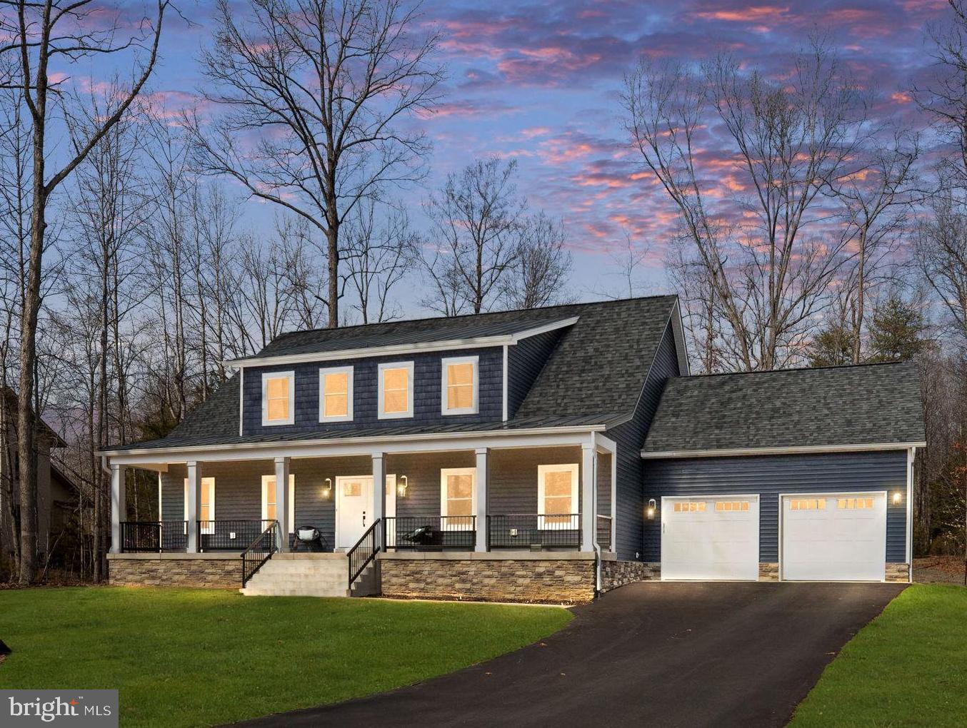 This stunning Craftsman Custom Home in the coveted waterfront community of Lake of the Woods is a true masterpiece that combines luxury, comfort, and unparalleled views. Nestled on a premium, spacious wooded lot, this property offers breathtaking vistas of the magnificent main lake right from your front porch. Imagine starting and ending your days with these picturesque water views!

As you step inside, you'll be captivated by the exquisite custom features and design elements that set this home apart. The engineered hardwood flooring, backed by a 100-year warranty, flows seamlessly throughout both levels, enhancing the home's warmth and elegance.

The chef's dream kitchen boasts a massive island perfect for food preparation, complemented by stunning quartz countertops and a designer herringbone oversized tile backsplash, complimented by a huge walk-in pantry. This space is as functional as it is beautiful, ideal for entertaining or family gatherings.

The primary suite is a sanctuary of relaxation, featuring a spacious layout with walk-in closets and a luxurious en-suite bath. Indulge in the double vanity sinks with quartz countertops, unwind in the separate soaking tub, or enjoy the oversized walk-in tiled shower.  A second generous bedroom and an equally luxurious second bath complete the main level.

At the end of the hall, discover an incredible office space adorned with custom built-in bookcases and leather countertops—perfect for remote work or as a private library retreat.

Venture upstairs to find a welcoming area for family and guests, featuring two additional bedrooms, a stylishly tiled bathroom, and a bonus room that serves as a fantastic recreational space for entertaining.

This home is packed with custom features, including a durable metal roof, a Generac generator, a gas tankless hot water heater, and a lawn irrigation system. The list of upgrades goes on!

Don’t miss your chance to make this exceptional home yours, situated in the amenity-rich community of Lake of the Woods, where lifestyle meets leisure. Residents enjoy access to a 550-acre main lake, a clubhouse for dining, a swimming pool, a fitness center with lake views, an 18-hole golf course, and a vibrant community center filled with various outdoor activities, clubs, and organizations. Make the move today—you won't want to leave!