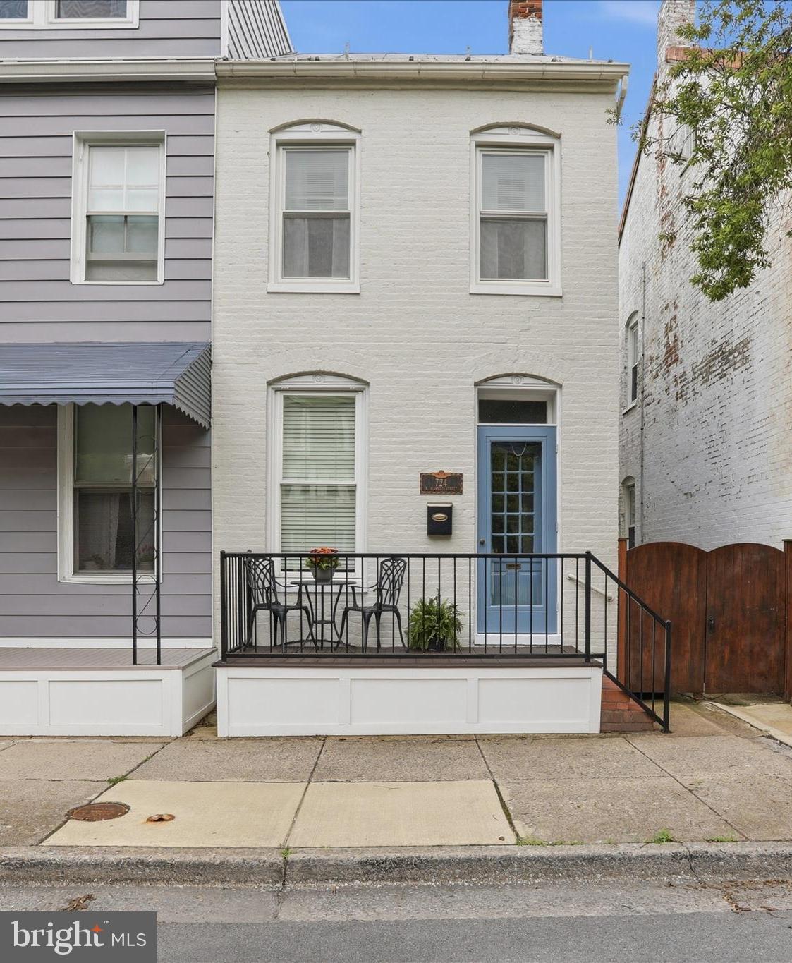 This semi detached rowhome in Historic Downtown Frederick is much larger than it appears. The first floor addition is currently being used as a family room, it could also function as a first floor Primary Bedroom. This home comes complete with updated kitchen and baths. New LVP flooring on the first level, the second floor boasts the well maintained original hardwoods. A large walk in closet and stackable laundry area compliment the second floor.  The industrial vibe finished 3rd floor is perfect for a guest room or home office.  The nicely landscaped backyard is highlighted by a brick patio, shed and off street parking for 2 cars and fully fenced for the dogs!! Just a few minute walk to the heart of Downtown Fredrick and a few minute drive to all major interstates. FYI-Tax records square footage does not reflect the 1st floor addition.
