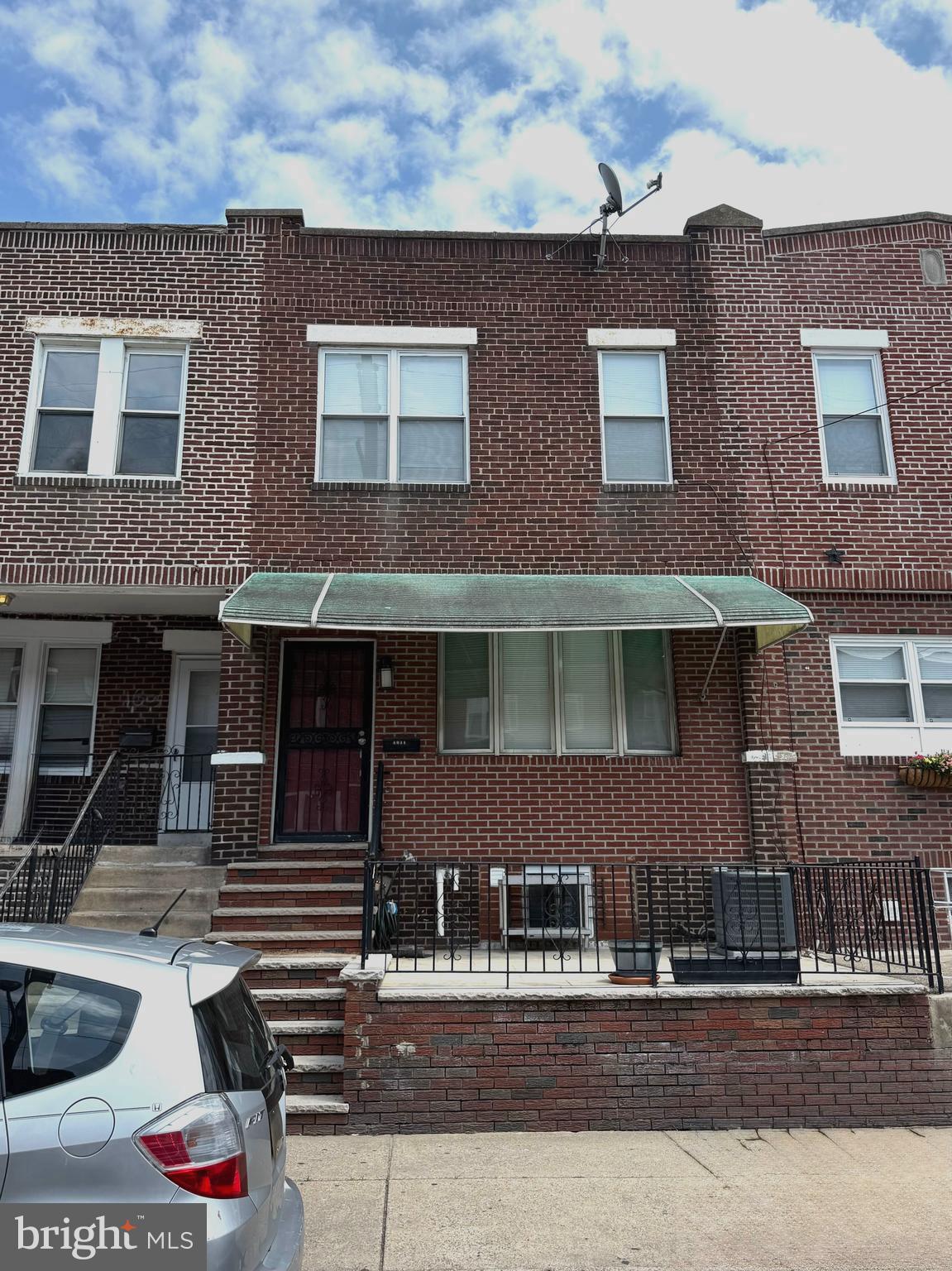 Welcome to this charming 3-bedroom, 2 full bathroom home located in the heart of Grays Ferry. This well-maintained, tenant-occupied property offers an excellent opportunity for both investors seeking immediate rental income and future owner-occupants. The home features a spacious living room, a dining area ideal for entertaining, and a kitchen with ample cabinet space. Upstairs, you'll find three comfortable bedrooms and a full bathroom, while the finished basement includes a second full bathroom, providing additional living space and convenience. Additional highlights include central air conditioning, a large basement storage room, and a cozy front yard perfect for relaxing or gardening. Conveniently located with easy access to public transportation, major highways, University City, and Center City, this property offers a combination of comfort, functionality, and strong investment potential.