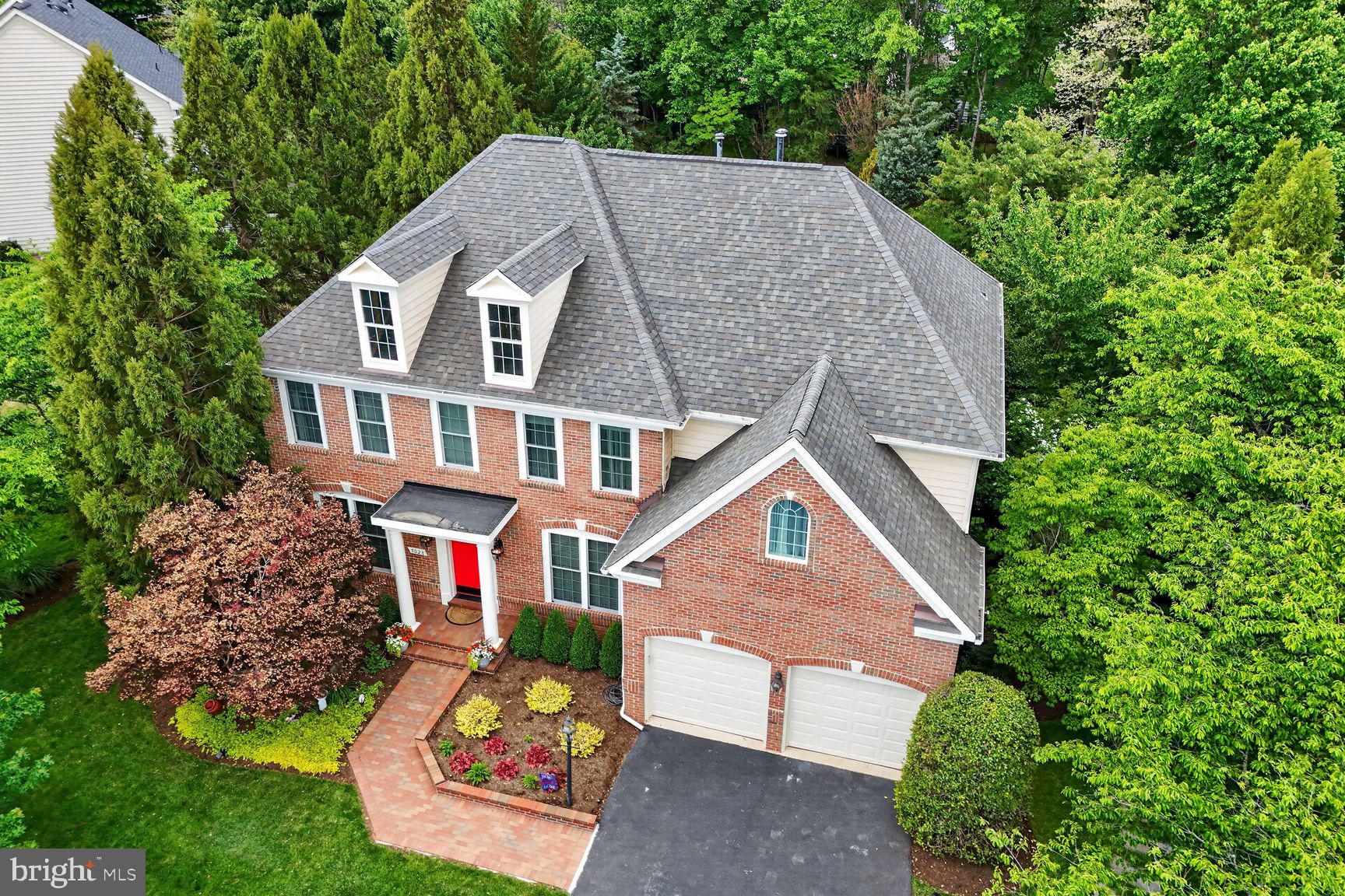 Stunning Home in the Prestigious Gated Golf Community of Piedmont. Set on over half an acre on a sought-after cul-de-sac street known for its expansive lots and beautiful homes, this property offers an unmatched private setting backing to mature trees.
With more than 4,500 finished square feet, the home showcases a fabulous layout designed for both everyday living and entertaining, enhanced by numerous upgrades and updates throughout. The spacious kitchen features elegant quartz countertops, upgraded appliances, cherry cabinetry, and a breakfast bar, flowing seamlessly into a bright and sunny morning room with a new sliding door leading to the deck. All major appliances have been replaced since the home was built, providing added peace of mind.
The dramatic two-story family room is a true centerpiece, complemented by a main-level study overlooking the serene backyard, along with separate formal living and dining rooms.
Upstairs, the owner’s retreat offers a generous bedroom, private sitting room, luxurious updated bath, and a walk-in closet. Bedrooms two and three share a Jack-and-Jill bath, while an additional bedroom and hall bath complete the upper level, with views overlooking the family room below.
The bright and spacious lower level is ideal for entertaining, featuring a large recreation room with a craft area, media room, and a full bath. A standout feature is the professionally built dance area, complete with a sprung dance floor, floor-to-ceiling mirror, and ballet barre—perfect for dancers or easily adaptable as a fitness or hobby space.
Step outside to a fully fenced backyard oasis with a massive stone patio and inviting outdoor living space surrounded by mature trees. The lush lawn and manicured landscaping are easily maintained with an in-ground irrigation system. Additional highlights include a storage shed, playground and trampoline area, electric pet fence in rear, and an extended driveway with ample parking.
Recent upgrades include new windows and doors throughout, including the front door, sliding glass door, and garage doors, enhancing both energy efficiency and curb appeal.
Residents enjoy exceptional community amenities, including indoor and outdoor pools, a fitness center, tennis courts, and access to an award-winning golf course — all within the neighborhood. The highly rated Battlefield High School, Bull Run Middle School, and Mountain View Elementary are all within a couple miles, with a convenient walking path to the middle school just down the street.
This home perfectly combines privacy, elegance, and convenience in one of the area’s most desirable communities.
**Exterior security cameras with audio/video recording are active on this property**