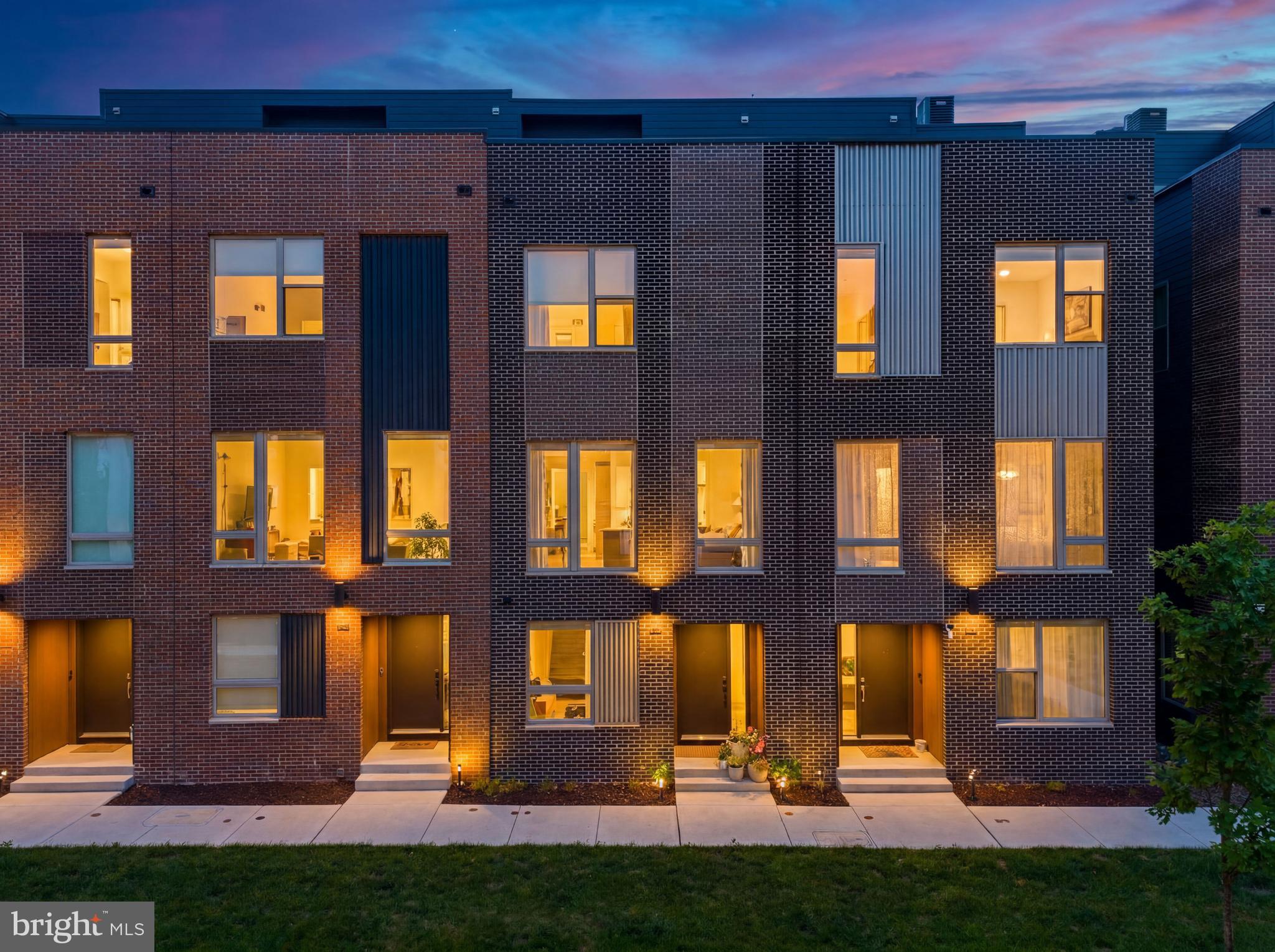 Experience modern waterfront-community living in this beautifully maintained 3-bedroom (4th bedroom can be walled off), 2.5-bath luxury townhome with approximately 7 years remaining on the FULL 10 Year tax abatement. Spanning four levels, this residence combines sophisticated design with smart-home convenience and over $86,000 in builder and post-settlement upgrades. The entry level features a versatile flex space ideal for a home office, playroom, or additional bedroom area if walled off, along with interior access to the 1-car garage and coat closet. The open-concept main level is designed for both everyday living and entertaining, showcasing engineered wide plank hardwood floors, crown molding, recessed lighting, built-in Bluetooth speakers, and abundant natural light. The upgraded eat-in kitchen features quartz countertops, white shaker cabinetry, GE stainless steel appliances ($3.6k upgrade), a gas range, center island seating, and over $17,000 in premium builder-selected kitchen, wet bar, and appliance enhancements. Additional builder upgrades include expanded hardwood flooring ($8.4k) throughout the upper levels, upgraded bathroom finishes, black fixtures, enhanced lighting, ceiling fan wiring, additional outlets, and an upgraded rooftop deck.

Beyond the builder selections, the current owners invested more than $40,000 in thoughtfully curated technology and lifestyle improvements, including Lutron motorized shades ($13k), custom networking and whole-home WiFi infrastructure, integrated audio throughout the home and rooftop deck, security cameras, a video doorbell system, monitored alarm capabilities, and a professionally designed walk-in closet ($9k). The third floor offers two spacious bedrooms, a full bath, and dedicated laundry area, while the entire fourth floor is devoted to the private primary suite featuring a custom walk-in closet and additional closet across from the bathroom, en-suite bath with double vanity sink and tiled shower, and wet bar ($11k) with beverage refrigerator.

The expansive rooftop deck serves as a true extension of the living space, featuring upgraded composite decking, built-in speakers, and panoramic water and sunset views—perfect for relaxing or entertaining. Residents enjoy beautifully landscaped green spaces, pedestrian pathways, and nearby riverfront trails, all while being just minutes from Fishtown, Northern Liberties, Penn Treaty Park, and the Delaware River waterfront. Convenient access to I-95, Center City, SEPTA transit options, neighborhood fitness studios, acclaimed restaurants, cafes, and entertainment destinations makes this an exceptional opportunity to enjoy one of Philadelphia's most desirable waterfront lifestyles.