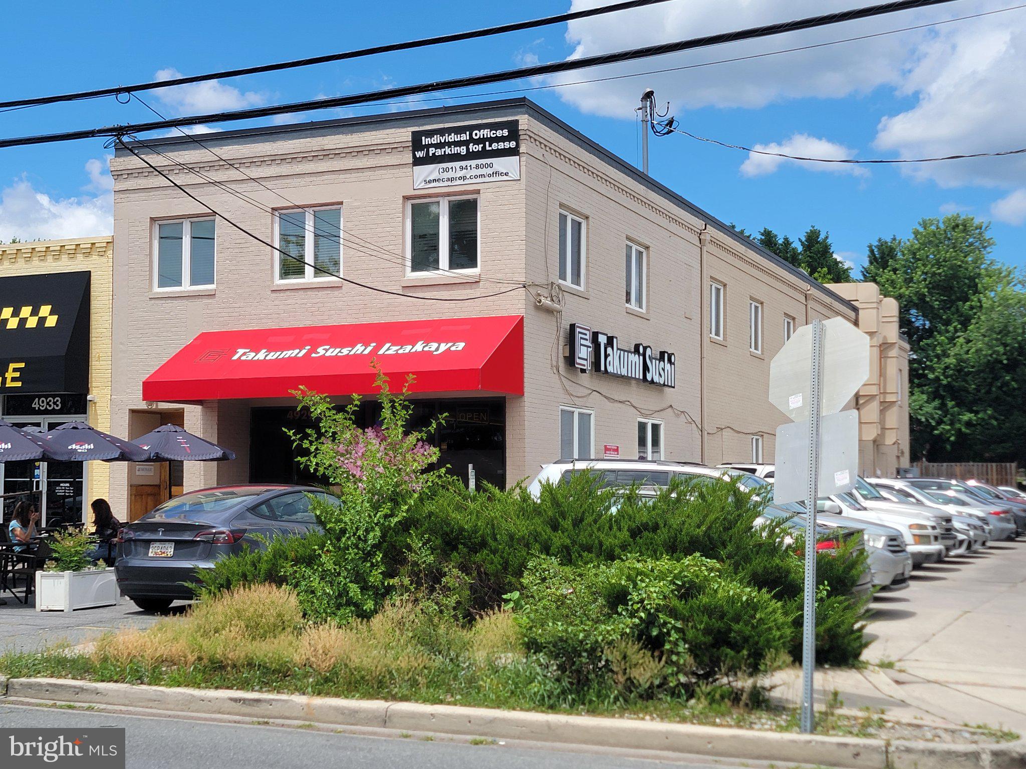 RARE Bethesda owner-user or investment opportunity with in-place income and a full-floor second-story office/retail suite in one of the region's premier walkable retail districts offering a FLEXIBLE OPPORTUNITY in an EXCEPTIONAL LOCATION:

Own a mixed-use property in the heart of Bethesda, directly on one of Bethesda's most vibrant streets. Step outside to more than 30 restaurants and 40 retailers, including Apple, Lululemon, CAVA, and other premier destinations, while enjoying immediate proximity to the sought-after Edgemoor neighborhood.
This flexible investment or owner-user opportunity allows an occupant to utilize the entire second floor while benefiting from income generated by the established sushi restaurant (Takumi Sushi) on the ground level. Investors also have the option to lease the second floor for additional income potential.
The second floor offers approximately 3,000 SF and features a rare full-floor layout with abundant natural light from corner-unit windows, providing exceptional privacy and flexibility for office, retail, medical, or showroom use. The current build-out includes:
• 8 private offices
• Conference room
• Reception area
• Kitchenette
• 2 restrooms (including one with a shower)
Additional features include secure access, on-site parking, and walkable access to the Bethesda Metro Station, local parks, and the Capital Crescent Trail.
Flexible occupancy options available. The second floor is also offered for lease. Ground floor is fully leased to Takumi Sushi.