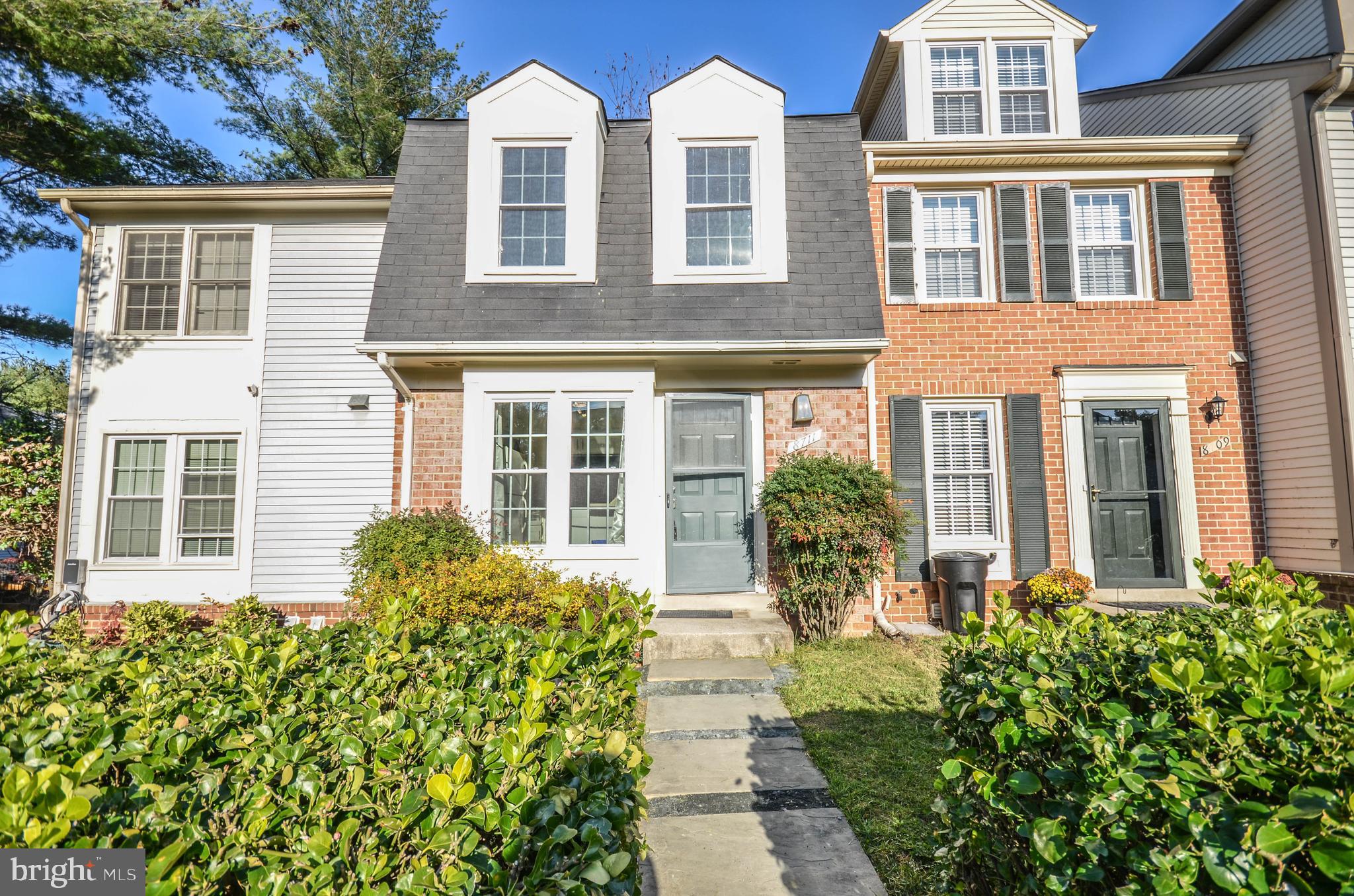 High-quality renovated three-level townhouse with 3BR/3.5BH in Montgomery Village! An additional sunny, spacious loft above the master suite is ideal for your home office. Main-level features include gleaming hardwood flooring, recessed lighting, a dining room that flows into the living room with a cozy wood-burning fireplace, and sliding glass doors to a private deck overlooking the tranquil common area. The open kitchen features high-grade soft-close cabinets, ceramic flooring, durable quartz countertops, and an island, adding ample storage space. The refrigerator, microwave, and dishwasher are all less than 4 years old. The upper level features hardwood flooring, an incredible master suite with soaring ceilings, a loft space with a skylight, a private bathroom with a double vanity, and an updated tub/tile shower. One more bedroom with its own private full bathroom, a linen closet, and glass shower doors completes this level. The lower walkout level features luxury vinyl plank flooring, a family room/3rd bedroom with an attached, full renovated bathroom, recessed lighting, and sliding glass doors to a fully fenced rear yard/patio. The lower level also has a spacious laundry room with a washer & dryer and ample space for additional storage. Many small touches, including energy-efficient double-hung windows, a hallway shoe cabinet, high-end fixtures, wrought-iron banisters, window treatments, and dimmers throughout. East Village is a quiet neighborhood located near shopping and restaurants and includes all the amenities Montgomery Village has to offer: community pools (the Lake Marion Community Center with pool and rec center is a 3-minute walk!), parks, tennis/basketball courts, gyms, bike trails, lakes, tot lots, and more!! Good credit required. Short-term lease acceptable. Pets are welcome with a pet deposit and a monthly rent. Two parking spaces are provided.  Most pets are OK with a $50 monthly pet rent. Good credit is required. Parking restrictions may apply for commercial-type vehicles and certain trucks.