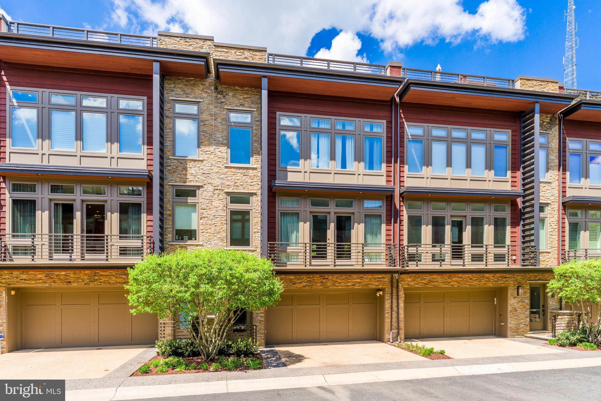 Rare Opportunity from Award-Winning Builder. This spectacular residence at Little Falls Place is perfectly located just 1 mile from Washington, DC backs directly to protected woods and the Capital Crescent Trail, offers 4-Level Elevator and a great Rooftop and 2 car garage.
This Luxury Townhome loaded with features: Gourmet chef’s kitchen high-end cabinetry and premium appliances, expansive center island, Dramatic great room with remote-controlled gas Fireplace, Floor-to-ceiling windows, Window Treatments, Wood Floors, Convenient main-level patio, Guest powder room, Three upper-level bedrooms including a primary bedroom with two walk-in closets, Full-size laundry conveniently located on the bedroom level, Finished lower level perfect space for a home gym, Private 4th-level Rooftop Terrace, outdoor gas fireplace, gas grill and outdoor kitchenette hidden behind a waterproof roll-up canvas screen featuring refrigerator, sink, dishwasher, lighting and TV.
Great opportunity to own one of the finest townhomes in such great Bethesda/Chevy Chase location, near Friendship Heights and downtown Bethesda, and upscale shopping and major commuter routes.