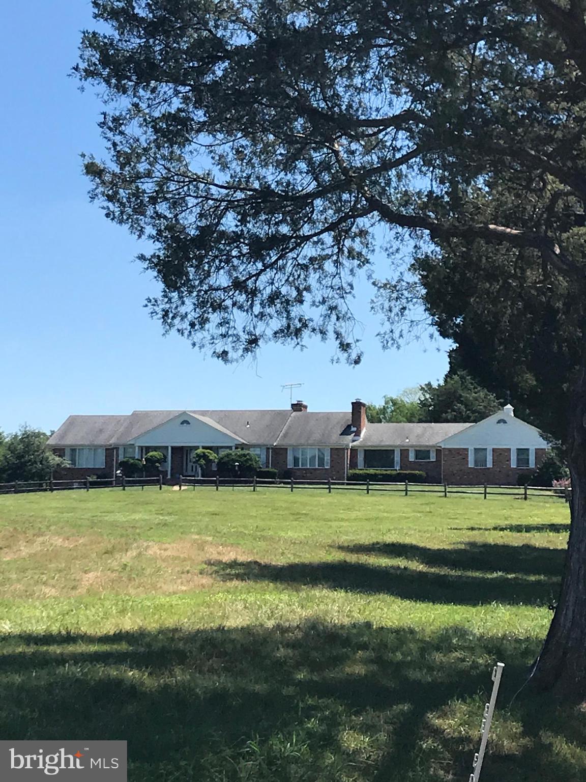 Rare Gem and opportunity to own your own country estate but close to everything! Nestled in the rural countryside just a little over the Prince William County Line past Nokesville in Fauquier  County(lower taxes). You have a clean canvas to do what you would like with a well crafted custom built home. The home has a brick exterior. The inside is spacious (even the bathrooms have a sitting area) with a Florida Room, Formal Living Room, and Several Rec Rooms and studies. The downstairs could be a home of its own featuring 2 bedrooms and 1 1/2 bathrooms wet bar, lots of storage a fireplace and more room! All the rooms are very large compared to the track builder homes. Cosmetically it needs to be updated, but lots of space and well built( Appliances, flooring, paint, counters and bathrooms. Barns(main barn not in such great shape), chicken coop, in ground pool, stream, pond and almost 60 acres fencing and paddocks separated by cross fencing with automatic waterers.  Close to Warrenton and 42 miles from Washington DC. Close to schools, shopping, dining and entertainment. According to seller the property has potential to subdivide for 2-3 additional homes( verify with the County)