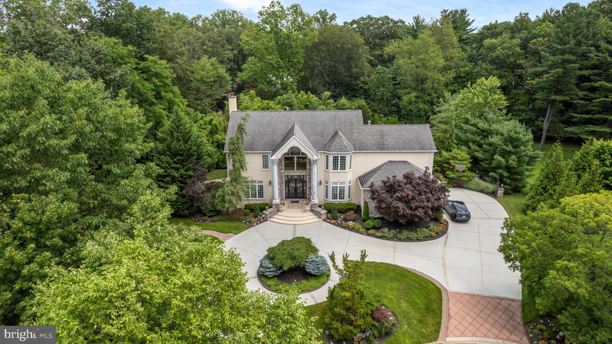Tucked away on a private cul-de-sac within the highly sought-after Council Rock School District, this impressive estate offers over 8,500 square feet of elegant living space on a beautifully landscaped acre. Designed for both entertaining and everyday living, the home features expansive living areas, abundant natural light, and a seamless layout connecting the gourmet kitchen to the spacious family room.

The property offers five generously sized bedrooms and multiple luxurious baths, including a private primary suite retreat. Thoughtful design and impressive scale provide flexibility for gatherings, work-from-home space, and comfortable living.

Step outside to a resort-style backyard with a stunning pool, perfect for summer entertaining and relaxing evenings. Situated in a quiet cul-de-sac while remaining conveniently close to shopping, dining, and major commuting routes, this remarkable home presents a rare opportunity to own a luxury estate in one of Bucks County’s most desirable locations.