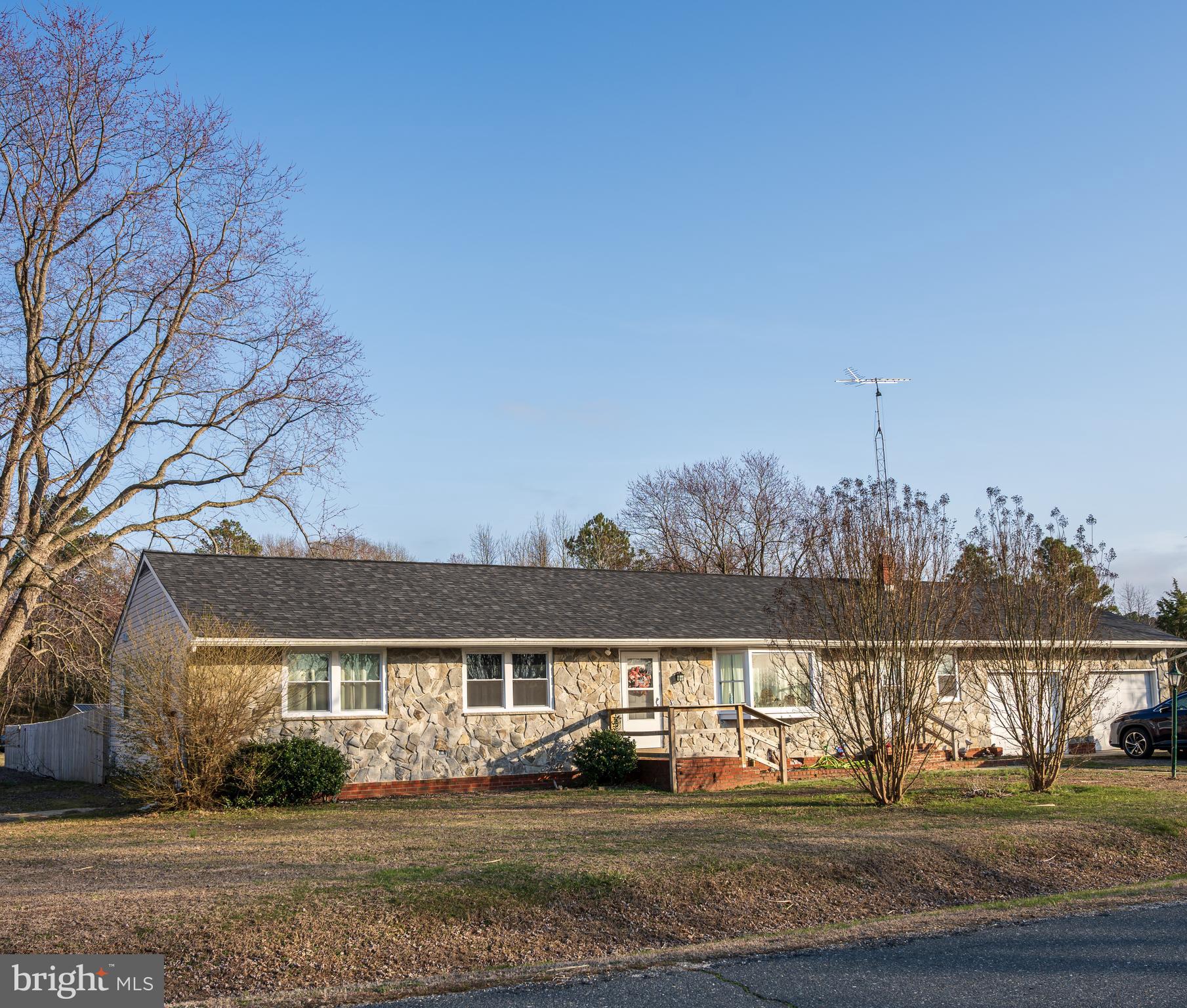Large One-Story Renovated Home with almost one acre of land. Welcome home to 5649 Thompsontown Road, just minutes outside of Cambridge. This home features an open floor plan with an amazing eat-in kitchen with granite countertops, stainless steel appliances, and soft-close cabinets, along with a sliding glass door that leads out to your back deck and enclosed backyard. You also have a separate living area/den, a large enclosed sunroom, and a door to your oversized attached 2-car garage with its own bathroom.

The home offers 3 large-sized bedrooms, with a full bath in the owner's suite. There is also more yard space beyond the fenced-in area if you wish to build a separate garage or shed. Corner lot. New HVAC with central air, new windows, a new electric panel, and a newer roof. This home will not last long.