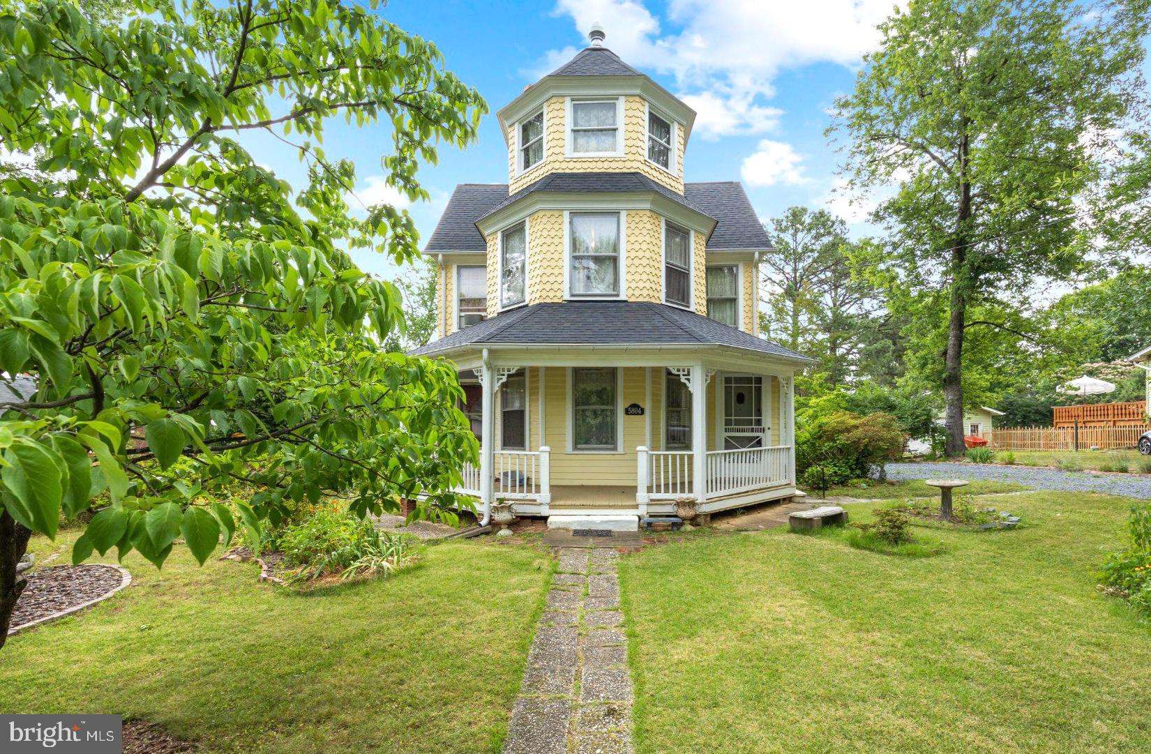 Step into a charming piece of history with this stunning Victorian home, built in 1888 and nestled in the desirable Berwyn Heights community. This detached residence boasts a unique architectural style that captures the essence of timeless craftsmanship. With 2,502 square feet of living space, this home features five spacious bedrooms and two full bathrooms, providing ample room for relaxation and comfort. The interior welcomes you with a traditional floor plan that seamlessly connects the dining area and a cozy kitchen,  perfect for gatherings. Natural light pours in through beautiful bay and bow windows, enhancing the warm ambiance throughout. The inviting living room features a classic fireplace with mantels, creating a perfect focal point for cozy evenings. Step outside to discover a generous 0.46-acre lot, complete with a level yard that offers both front and rear spaces for outdoor enjoyment. The wrap-around porch invites you to unwind while enjoying the serene surroundings. Additional exterior features include a secure storage area, landscaped gardens and a gazebo, for relaxing and ensuring peace of mind. This home is equipped with essential appliances, including a gas oven/range, refrigerator, washer, and dryer, making daily living a breeze. With off-street parking and a driveway, convenience is at your fingertips. Experience the historic charm and much desired community, where every detail invites you to create lasting memories. Note recent updates and improvements: new roof, gutters downspouts, exterior paint, brand new main water line and water supply lines through the house as well a new hot water heater.  The home can benefit from some TLC, and is being sold as is.