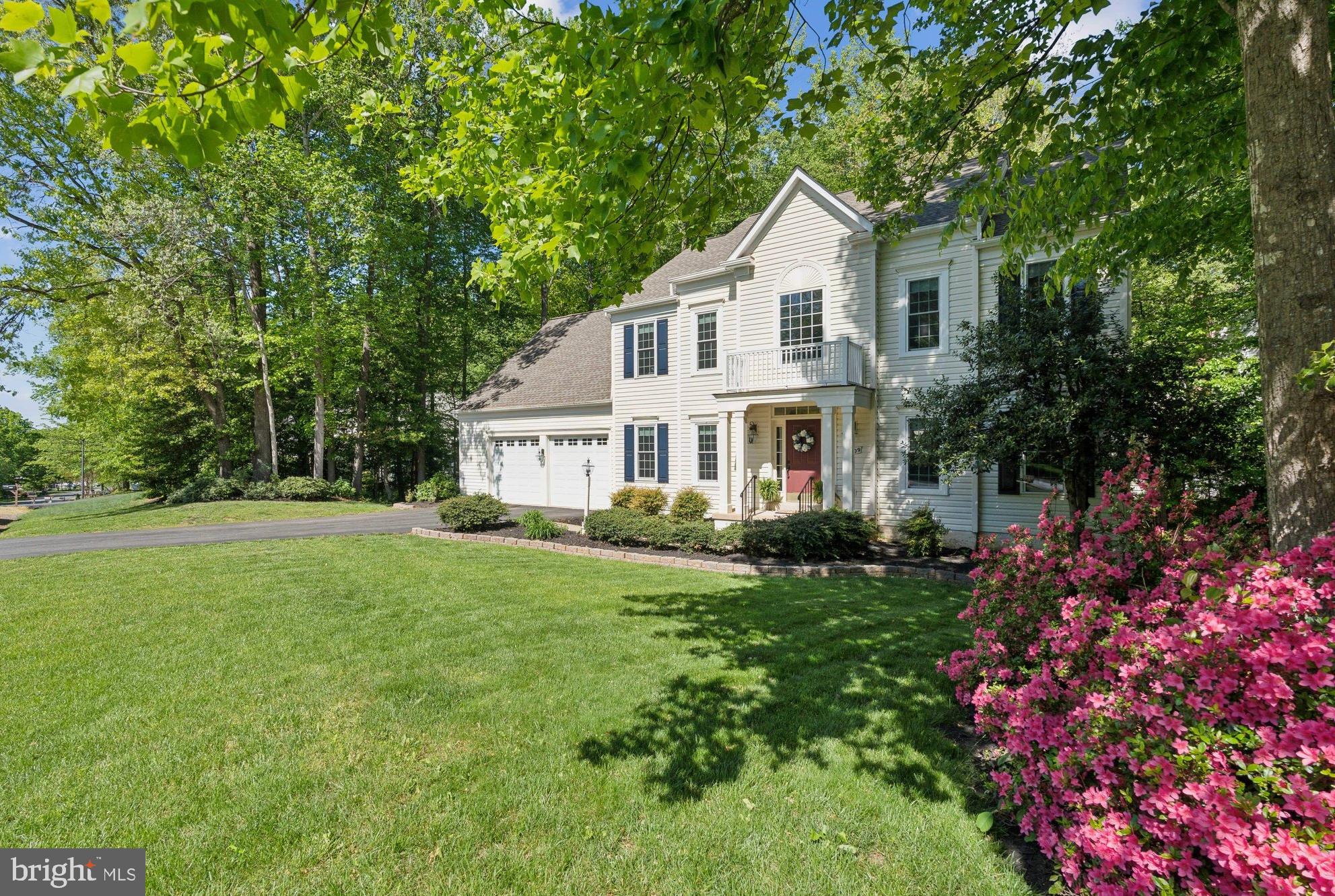 * Tucked into a quiet and coveted rural neighborhood, this spacious Colonial sits on nearly half an acre of manicured lawn and scattered woods, offering both privacy and room to roam. * The two-story foyer invites you in, welcoming you with natural light pouring through  walls of windows (all windows replaced in the last few years). The front of the home offers the traditional rooms, including a cozy sitting room and a formal dining room—perfect for gatherings or a quiet evening in. Toward the back, the layout opens up. The kitchen, informal dining area, and living room flow together effortlessly, all bathed in sunlight from even more windows. Just off the kitchen, an oversized back deck is ready for summer BBQs, backyard games, or simply enjoying the view of the yard and play area. The main floor also includes a bedroom with an adjacent ADA-compliant bathroom. With a few adjustments, this room could be made fully wheelchair accessible, making it a flexible option for guests or multi-generational living.
* Upstairs, you'll find three spacious bedrooms—two with walk-in closets—and a large primary suite with tray ceilings, a walk-in closet, and its own en-suite bath. A second stairwell leads to the bonus room over the garage, currently used as a one-of-a-kind playroom with twin Murphy beds and a secret entrance—definitely a highlight for hide-and-seek fans, but easily adaptable to suit whatever you need. * The finished basement adds even more living space and opportunities, including a TV room with built-in screen and AV setup, a “snackbar,” an exercise room, a seventh bedroom, a full bath, AND a workshop with its own outdoor entrance! * With an oversized garage and additional storage under the deck, this home is as functional as it is welcoming.  * Lots of fresh paint throughout, and all new windows and the basement sliding glass door installed in 2023.  A new washer, dryer and refrigerator over the past few years to boot. Come take a look—you might just find it's exactly what you've been looking for... * Alexa on property.