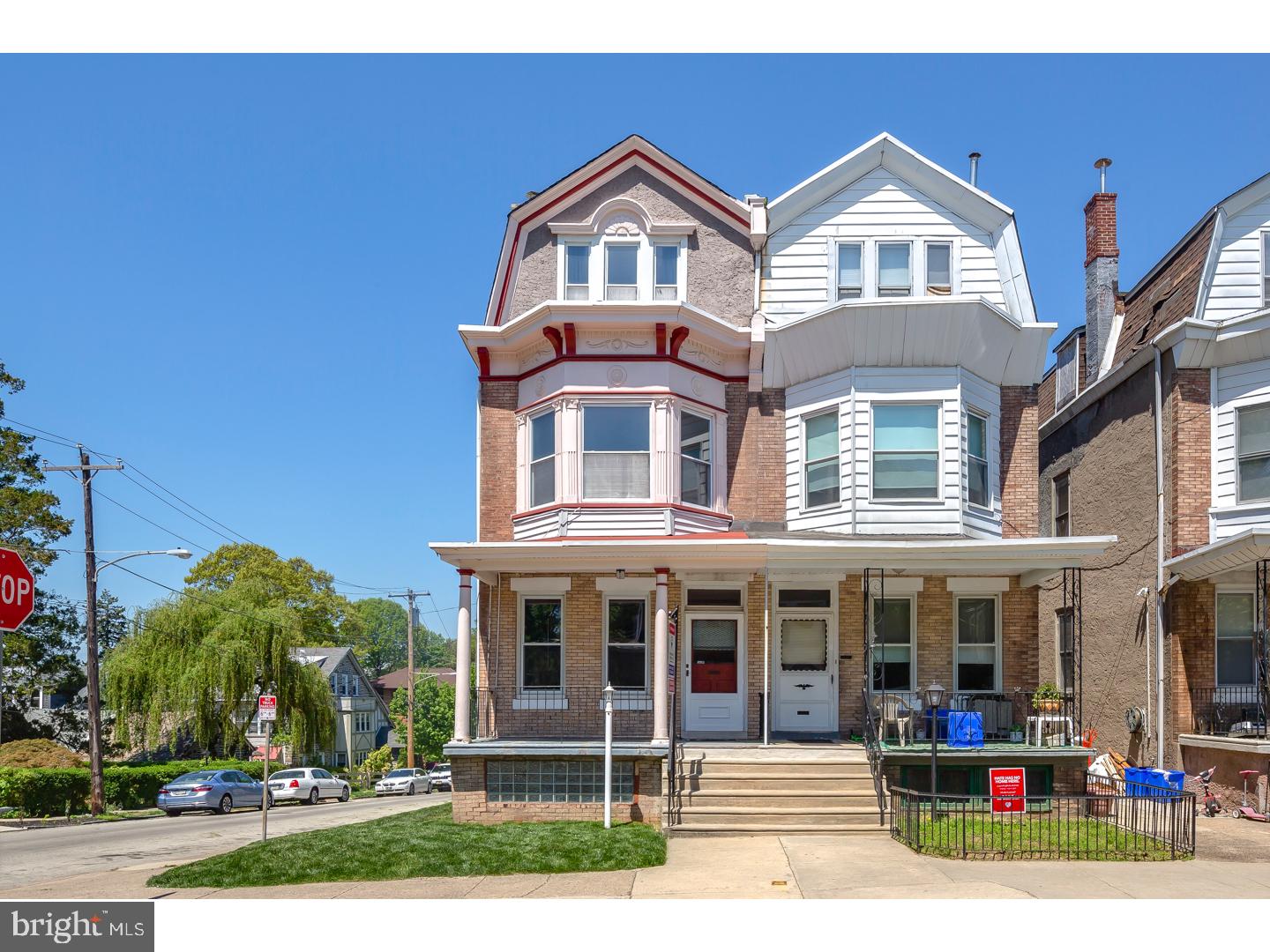 Meet this beautiful twin residence in West Mount Airy with old charm and new improvements.  This home sits on the end of the block and has a ton of windows with plenty of natural light. There is an attached 1 car garage. A 5 minute walk to the regional rail Upsal Station and Germantown Avenue. Also very close to hiking and biking trails Wissahickon Park.Enter through the front door into foyer and past the original stain glass entry doorway into the spacious living room with high ceilings and brand new hardwood flooring.Walk through the living room into a formal dining room with crown moldings, shadowbox wainscoting, and a beautiful chandelier.Continue through to find yourself in an updated kitchen with large peninsula, great for dining and entertaining.  Granite countertops and sleek black appliances look great.Finally enter into a mud room perfect for storage before walking outside onto an elevated wraparound porch overlooking private green backyard.Upstairs you will find 2 fully renovated bathrooms and five spacious bedrooms. Master bedroom has been renovated with walk-in closet.Other key features include a single zone automatic irrigation/sprinkler system, large full length basement with washer and dryer, brand new steam furnace.