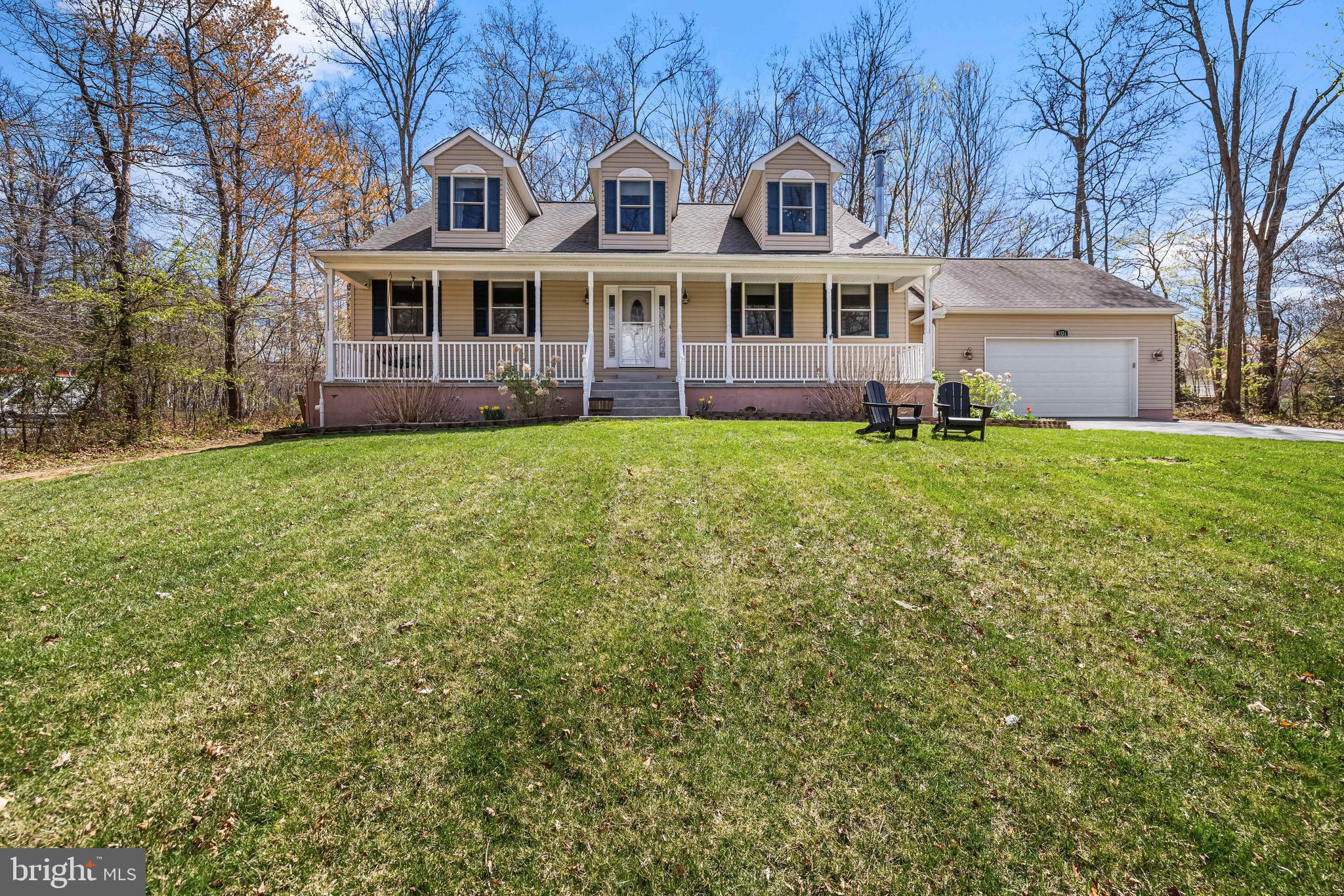 Beautiful updated Cape Cod built in 2013 with a little over an acre and a private setting.  Spacious office with glass french doors and new carpet. First floor Primary bedroom with new carpet. Main floor hardwoods were just refinished.   Gourmet kitchen is open to breakfast room and family room.  Spacious mud room with lots of storage just off the 2 car garage and laundry room.  Upper level has two generous size rooms with new carpet and one full bath.  Lower level was fully finished and redone in 2019 with a wood stove, full bath, bedroom and oversized recreation room and family room.  Do not miss this move in ready home!!
