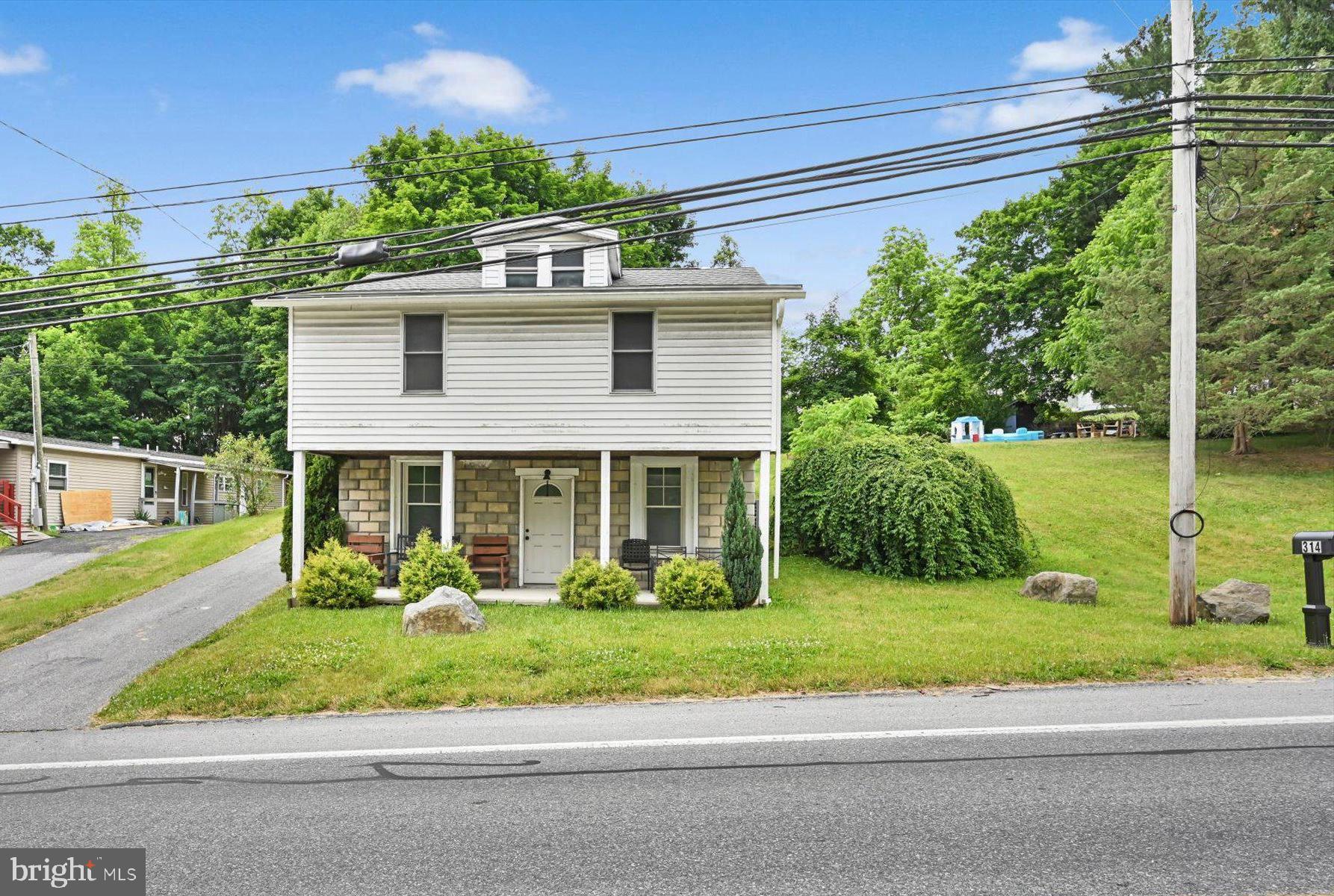 This well-maintained ranch offers the perfect blend of comfort and convenience. Featuring 3 bedrooms and 1.5 baths, this home provides easy one-floor living with additional finished space to suit your needs. The primary boasts a walk-in closet, and you'll appreciate the abundance of storage space throughout the home, making it easy to keep things organized.  Updated with new luxury vinyl plank flooring and carpet, the interior is fresh. The eat-in kitchen comes equipped with granite countertops and stainless steel appliances. Need extra space? The finished lower-level rec room with walkout access is perfect for entertaining guests, a home office, gym, or an additional bedroom! Major updates provide peace of mind, including a heat pump with central air (2019), roof (2019), newer well pump and tank (2020), and 200 amp electric service. Outside, a blacktop driveway leads to ample parking and a private yard, offering plenty of room to relax or play. Don't miss your opportunity to make this move-in ready ranch your next home!
