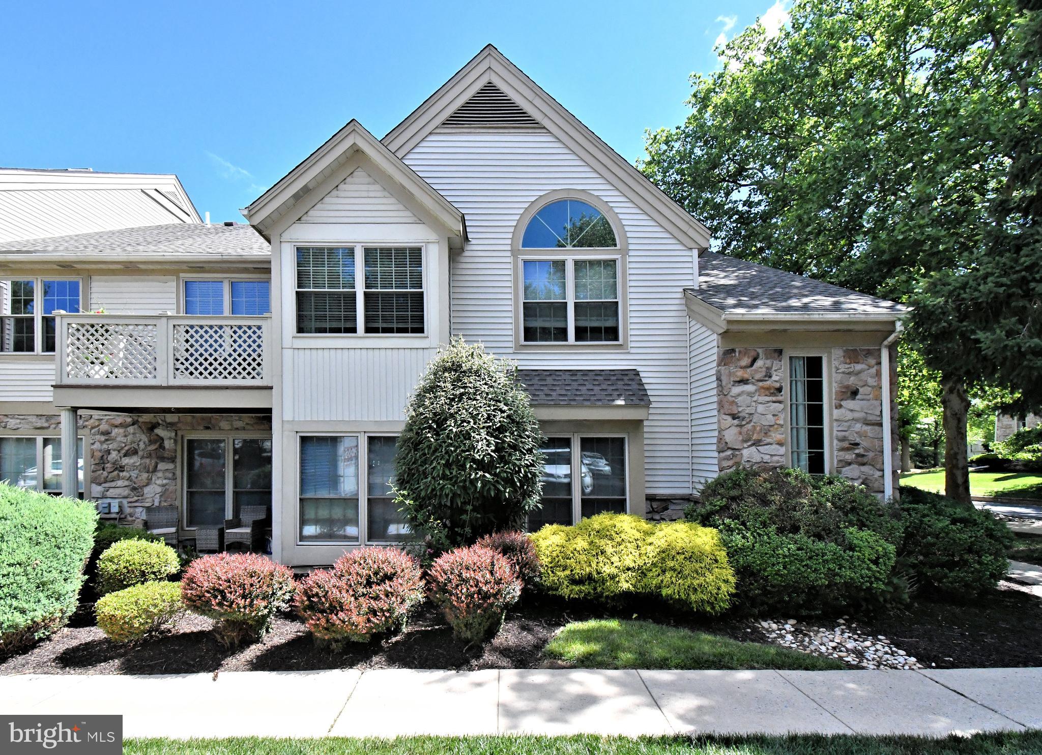 Welcome to this beautifully maintained and tastefully updated second-floor condo in the highly sought-after Montgomery Brook community. From the moment you enter, you'll appreciate the bright, airy atmosphere created by the open floor plan, soaring cathedral ceilings, and stunning palladium window that fills the living space with an abundance of natural light. The spacious living room flows seamlessly into the dining area and kitchen, making this home ideal for both everyday living and entertaining. The kitchen features beautiful quartz countertops, a breakfast bar for casual dining and an open design that keeps you connected to guests and family. Sliding glass doors from the dining area lead to a quaint balcony, offering the perfect spot to enjoy your morning coffee, unwind after a long day, or take in the peaceful community surroundings. The generously sized primary suite serves as a private retreat, complete with a large walk-in closet and a fully customized, remodeled en-suite bathroom featuring an extended vanity, elegant tile shower, updated fixtures, and a convenient linen closet. The thoughtful split-bedroom floor plan places the second bedroom and full hall bath on the opposite side of the home, providing privacy for guests, family members, or a home office. A conveniently located laundry closet adds to the home's functionality. Residents enjoy a carefree lifestyle with the association covering exterior building maintenance, roof maintenance and replacement, water, sewer, trash removal, snow removal, lawn care, and common area maintenance. Montgomery Brook offers exceptional amenities, including a community clubhouse, outdoor swimming pool, tennis courts, beautifully landscaped grounds, walking paths, and abundant open green space. Located in desirable Limerick Township within the award-winning Spring-Ford School District, this home is just minutes from shopping, restaurants, parks, recreational facilities, and major employers. Enjoy convenient access to Route 422, King of Prussia, Collegeville, Phoenixville, and the Philadelphia Premium Outlets, making commuting and everyday errands a breeze. Whether you're a first-time buyer, downsizing, or simply looking for low-maintenance living in a prime location, this move-in-ready home offers the perfect combination of comfort, convenience, and community. Don't miss your opportunity to make this exceptional Montgomery Brook condo your new home!