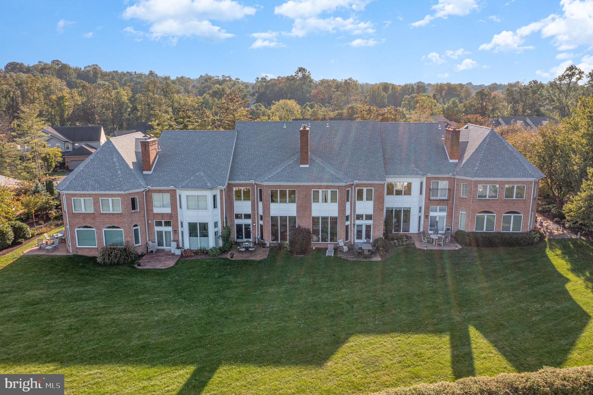 Welcome to the definition of luxury living in Central Pennsylvania's prestigious maintenance-free community, Bridgeport. This exclusive listing boasts unparalleled million-dollar views that will leave you in awe. Behold the captivating vistas of the Harrisburg skyline, the majestic river, the mesmerizing fireworks display from City Island, the intricate web of countless bridges, and the endless panorama of gently rolling hills. Such sights are simply beyond compare. Be greeted by flower gardens in your private courtyard, creating an inviting and serene atmosphere right at your doorstep. Stepping inside, you will be stunned by the breathtaking view that extends seamlessly across the Susquehanna River to the iconic Capitol dome. With floor-to-ceiling windows, this home provides a front-row seat to the beauty of the panoramic painting that unfolds both day and night. This residence offers the convenience of an elevator that services all three finished levels. The attention to detail is evident in every room, featuring elegant hardwood floors throughout the first floor, crown molding in every room, custom-designed stair railing, and luxurious materials such as marble, granite, and quartz. Pocket doors, wainscoting, and chair rail further enhance the exquisite interior. The bathrooms have been upgraded with comfort-height toilets equipped with ToTo heated seats and built-in bidets. Entertain in style with the recently added living room bar complete with pull-out shelves. The large windows in the master bedroom offer the privilege of waking up to the arresting views every morning. A heated, spacious two-car garage with epoxy floors, newer HVAC, water softener, and reverse osmosis water systems, with over 3,000 square feet of meticulously designed luxury living space, this home is a testament to the utmost in quality and comfort. A proximity to Negley Park adds to your outdoor enjoyment. This is your opportunity to move right in and begin enjoying the most spectacular views in the area, offering a veritable feast for your senses in every season. Whether you prefer the sun-kissed greens of spring or the warm hues of autumn, the ever-changing scenery will enchant you in all directions. Don't miss your chance to make this exceptional property your own and experience the pinnacle of luxury living in Central PA's Bridgeport community.
