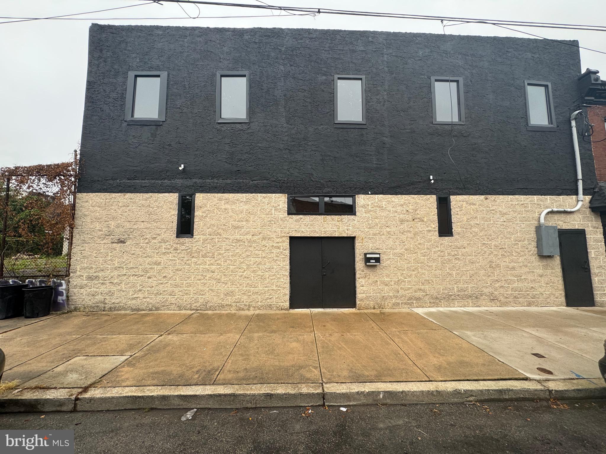 This property is huge. It has a basketball court inside. Over 6,000 sf. Great investment!!